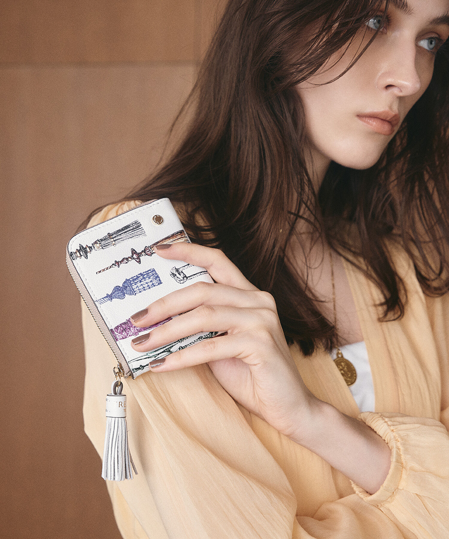 TOPKAPI TREASURE「【TREASURE TOPKAPI】シュリンクレザー タッセル プリント ラウンド 二つ折り財布」|財布|