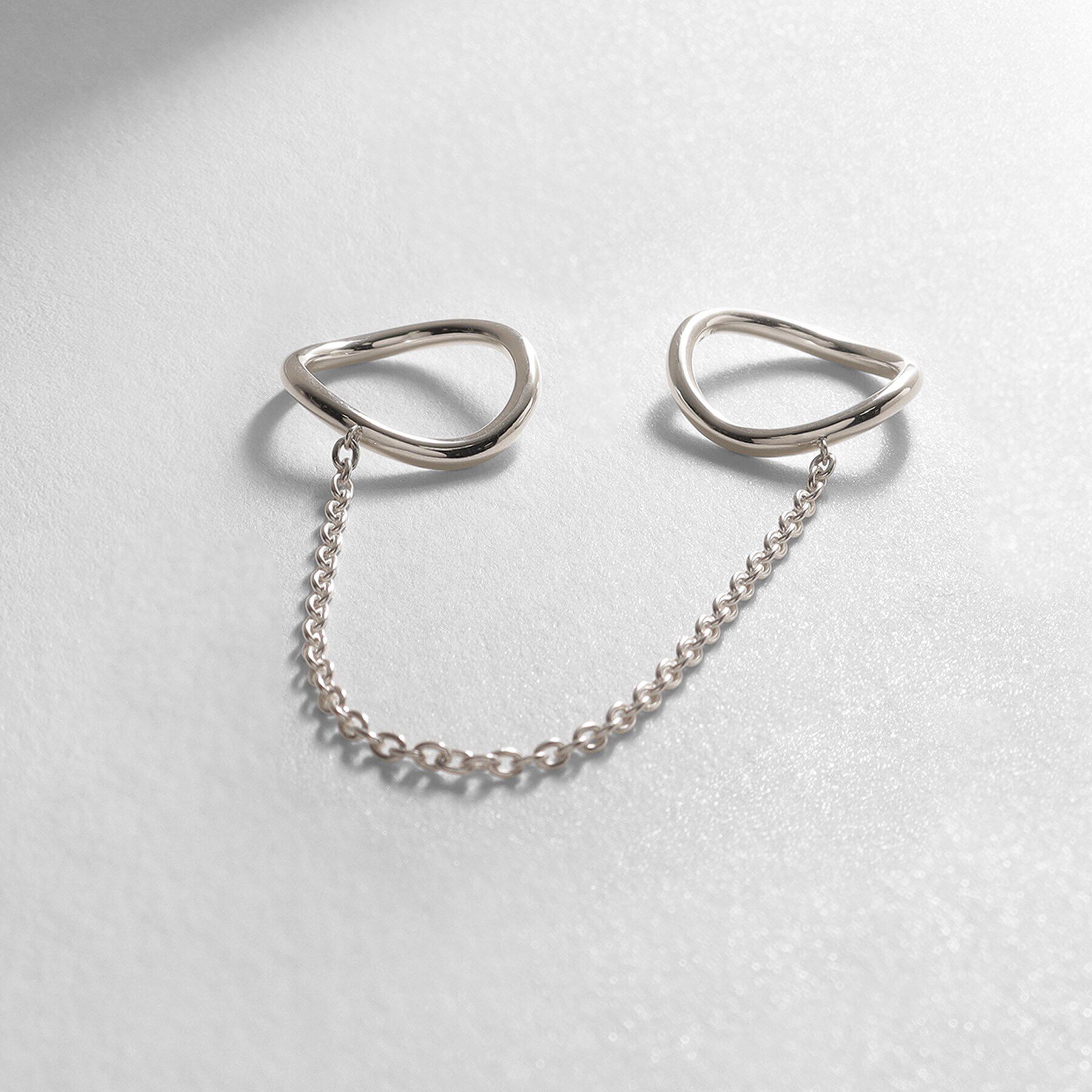 COCOSHNIK ONKITSCH「シルバー ドレープチェーン ダブルカーブリング」|リング|