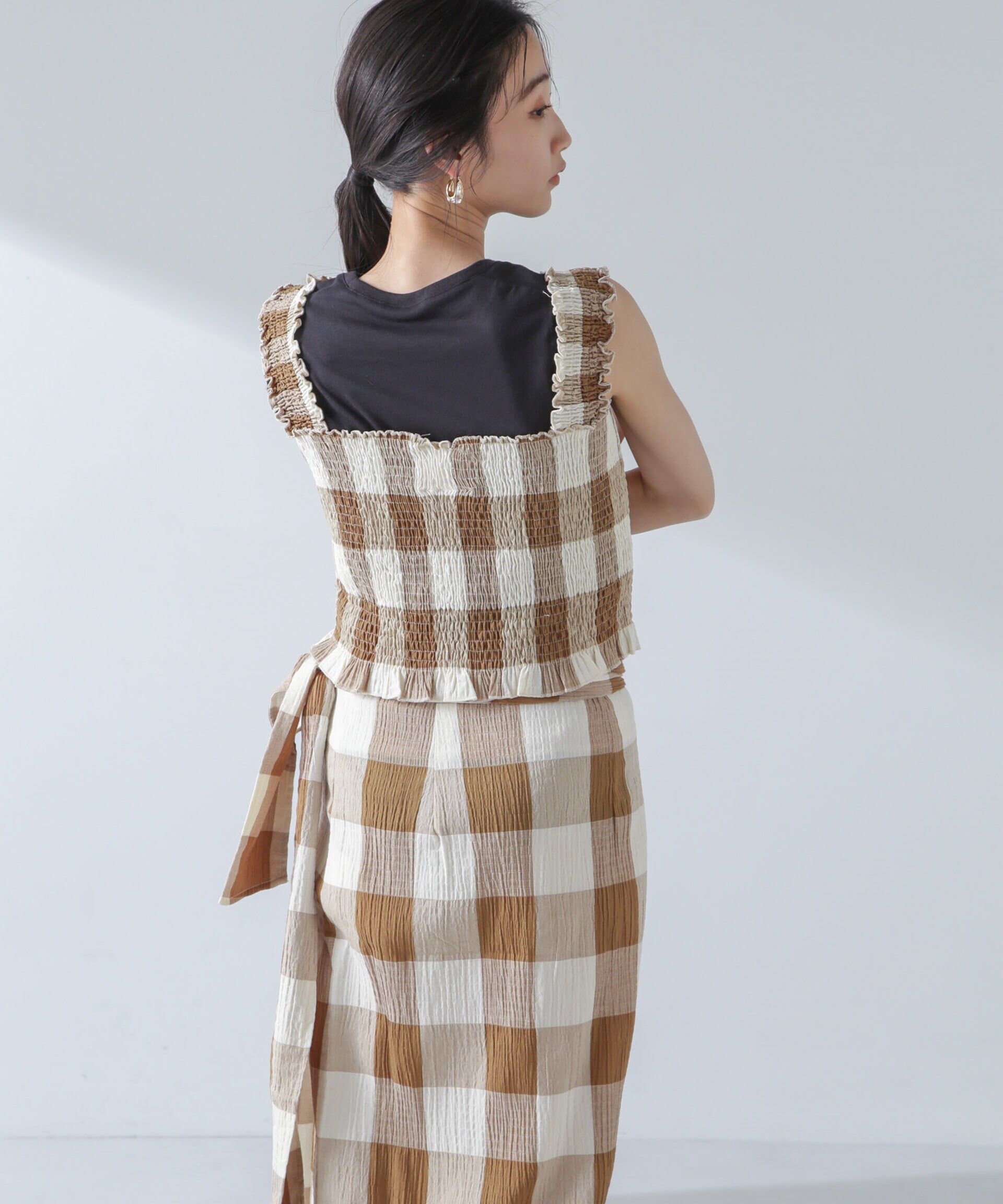 nano･universe「RITA ROW/Checkered smocked body top」|ダウンベスト・ベスト|