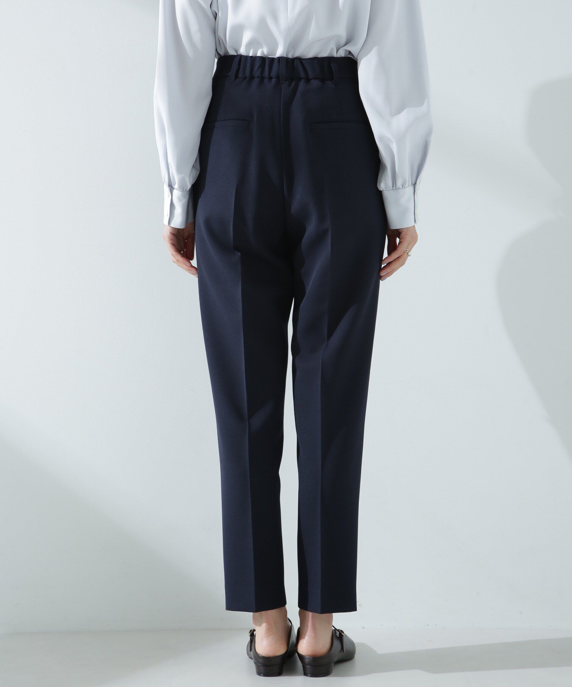 nano･universe「デイリーファンクション タックテーパードパンツ(セットアップ可)」|チノ|