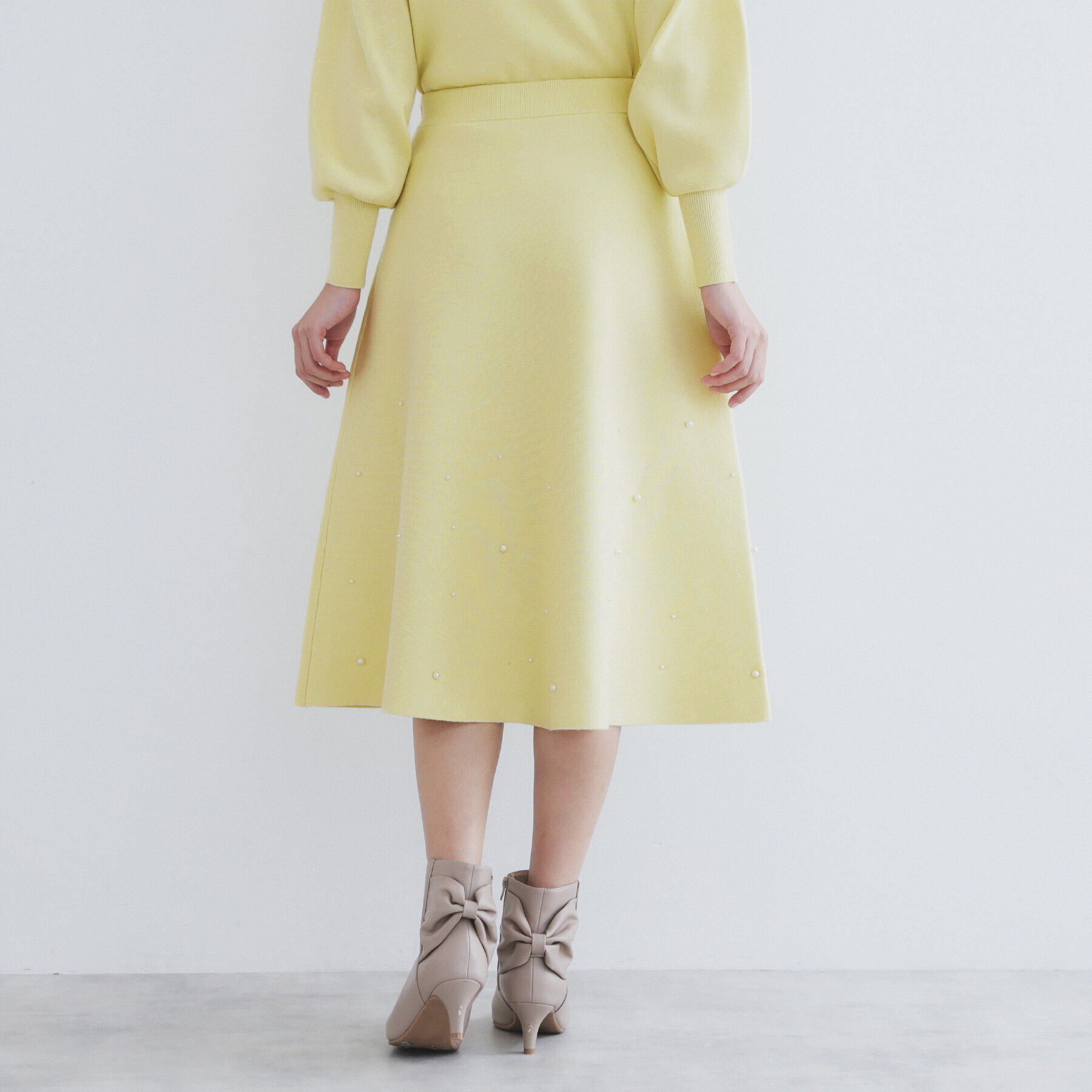 index「《美人百花掲載》パール調フレアニットスカート/セットアップ対応【洗濯機洗い可】」|スカート|