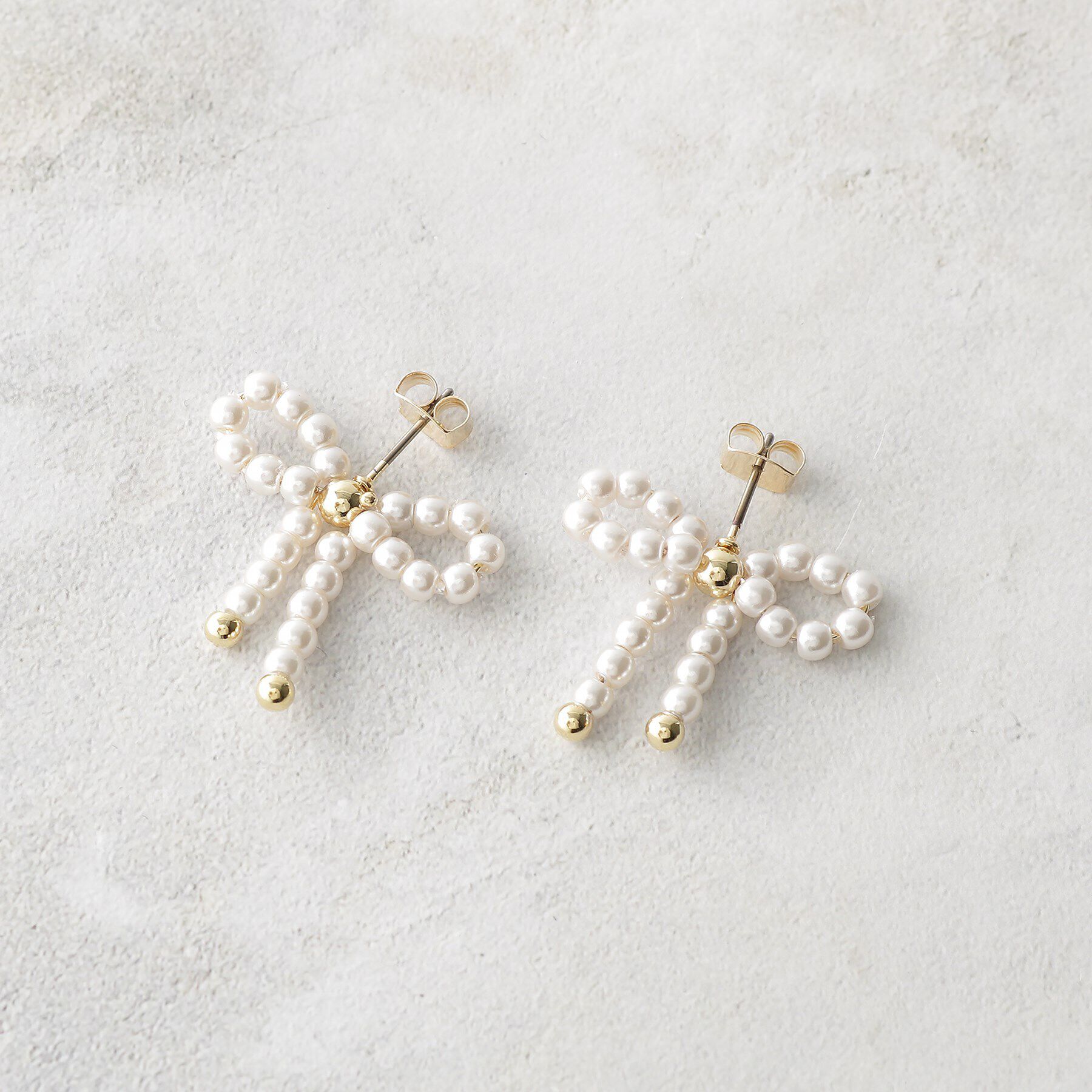 OPAQUE.CLIP「フェイクパールリボンピアス」|ピアス|