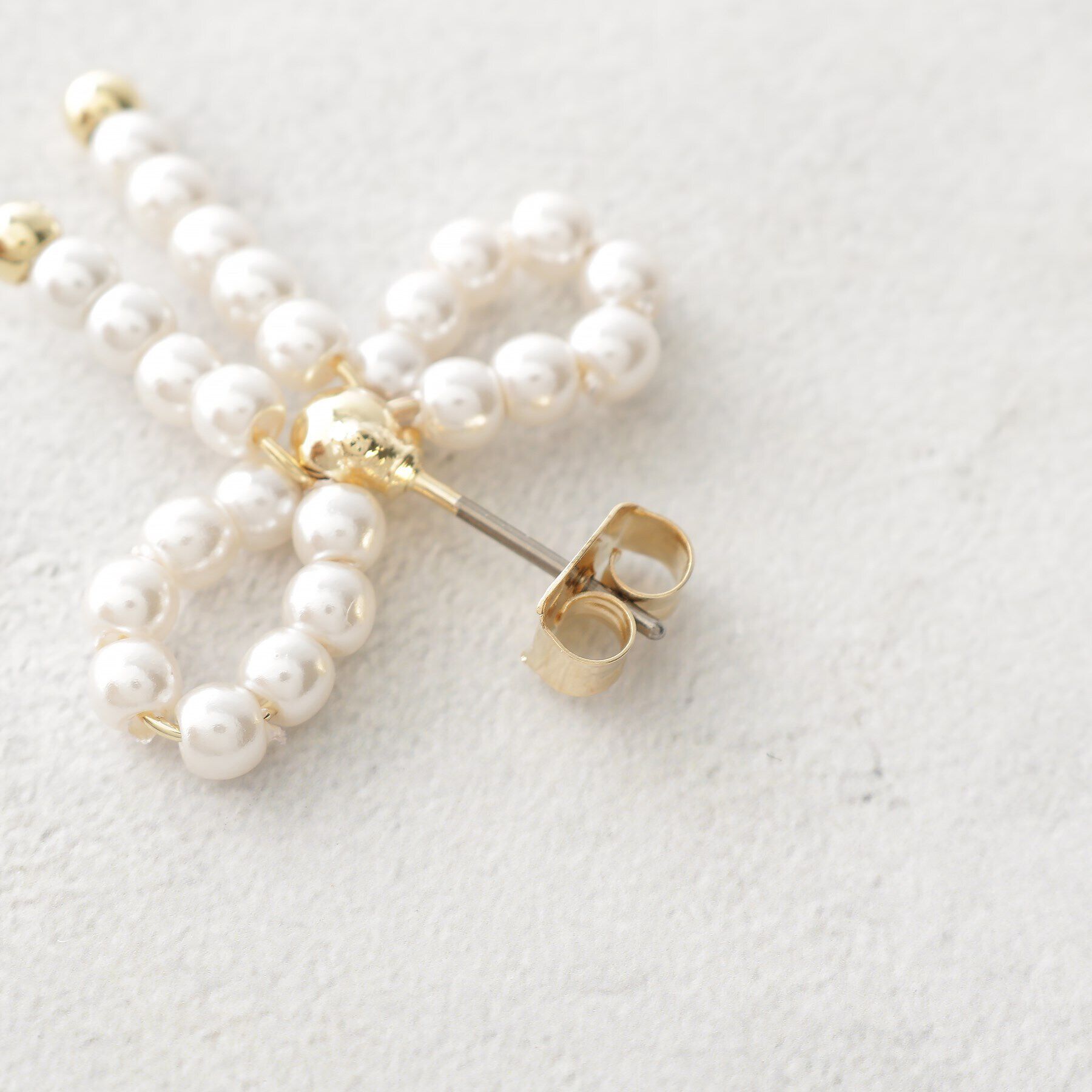 OPAQUE.CLIP「フェイクパールリボンピアス」|ピアス|