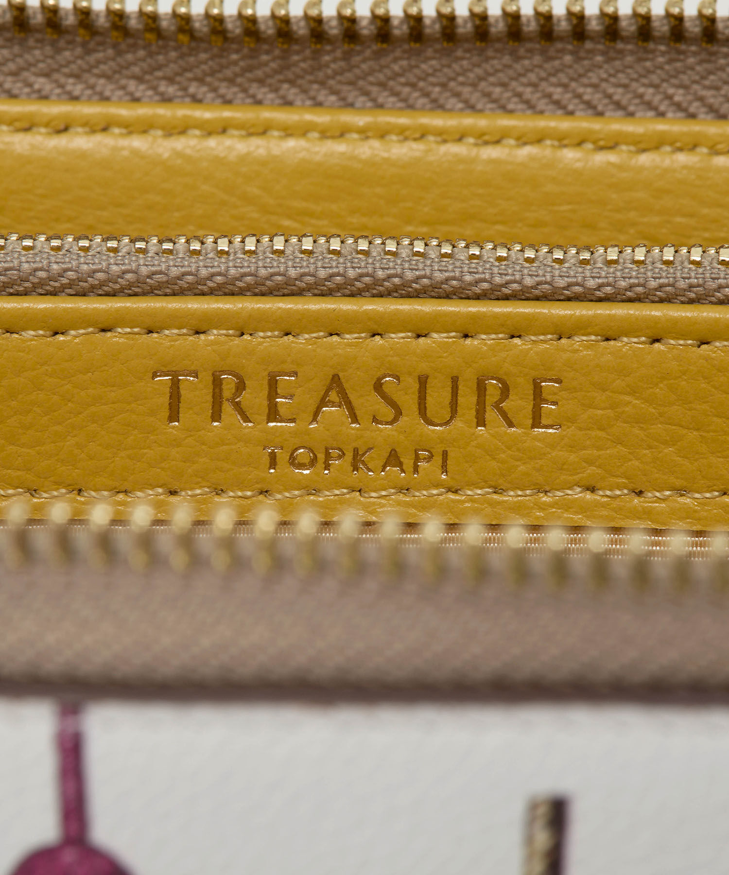 TOPKAPI TREASURE「【TREASURE TOPKAPI】シュリンクレザー タッセル プリント ラウンド 長財布」|財布|