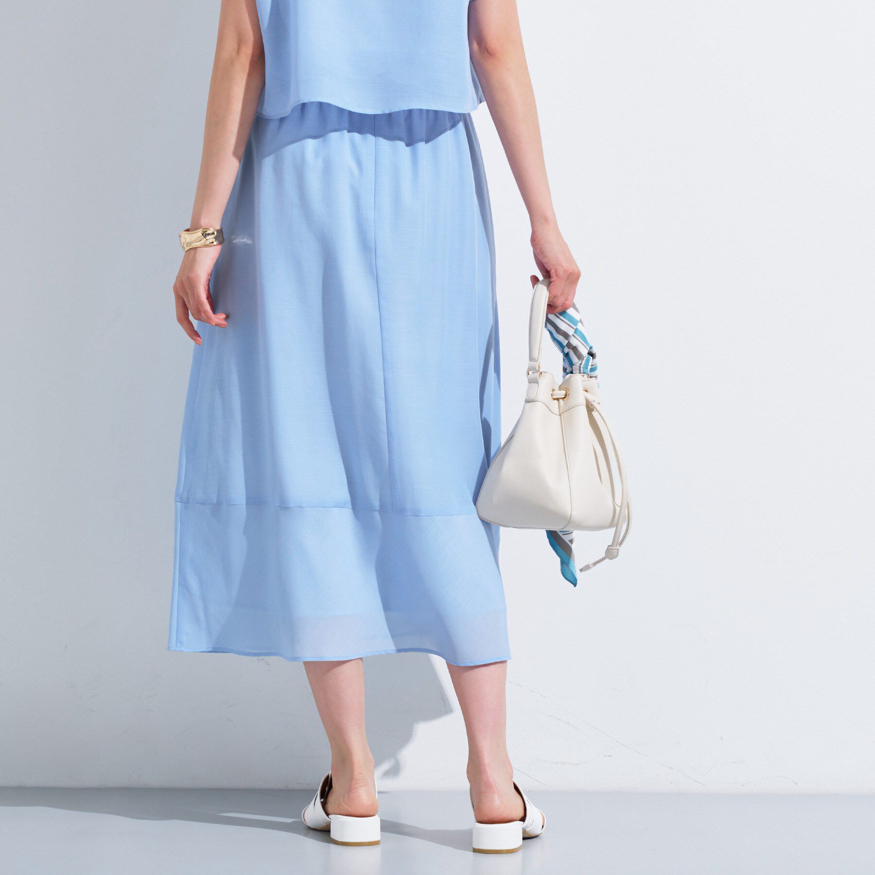 INDIVI「新色登場！【洗える／エアリー素材】巻き風ロングスカート」|スカート|