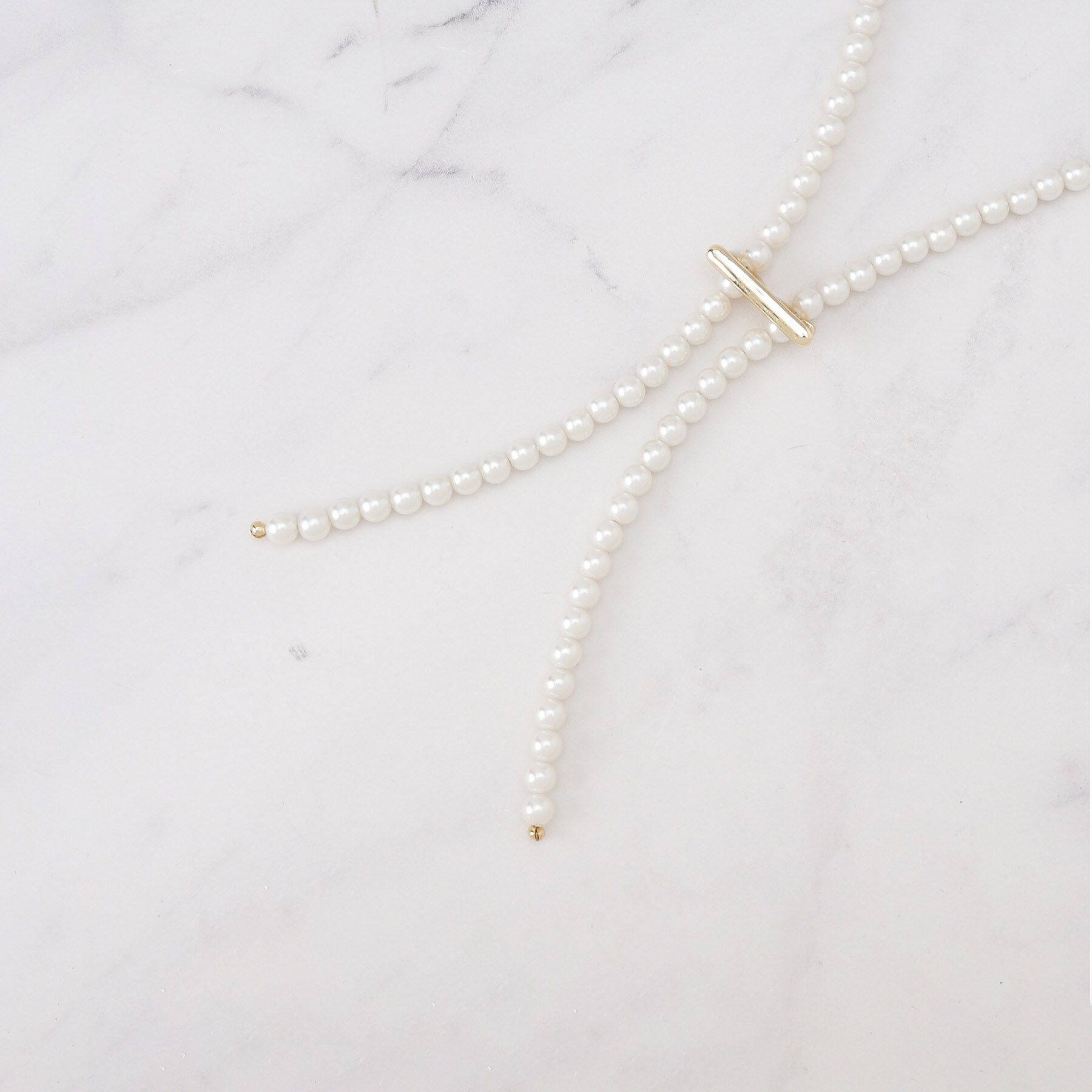 INDIVI「パール調ボウタイネックレス」|ネックレス|