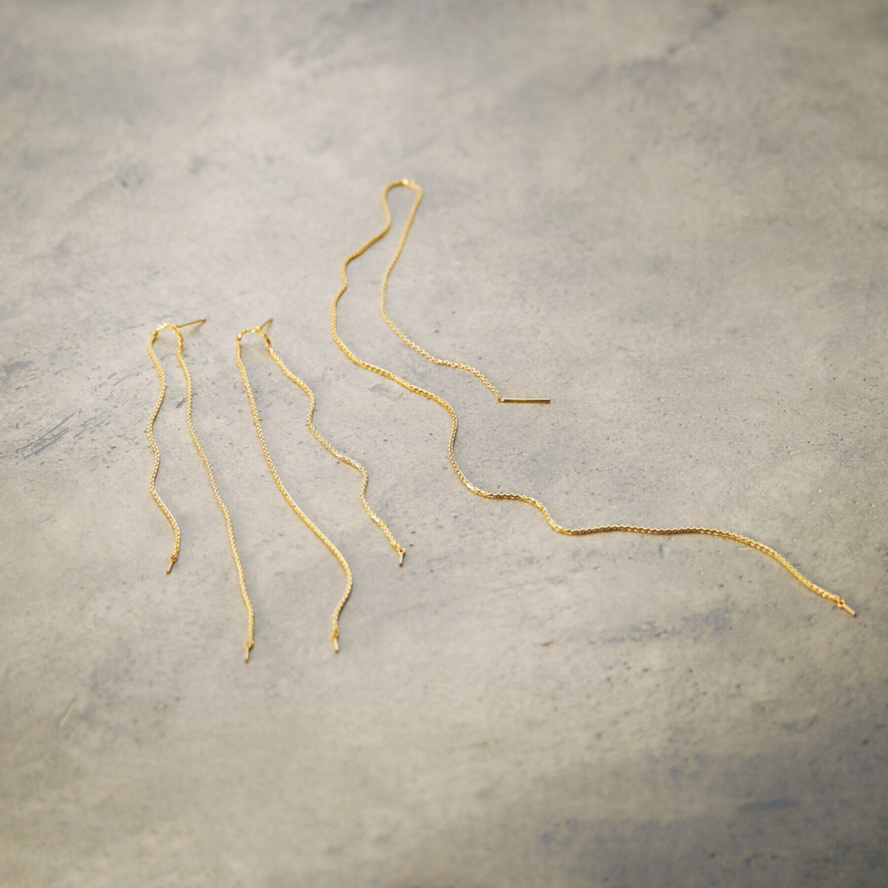 COCOSHNIK「K10スパイクトリプルロング スタッドピアス（片耳用）」|ピアス|