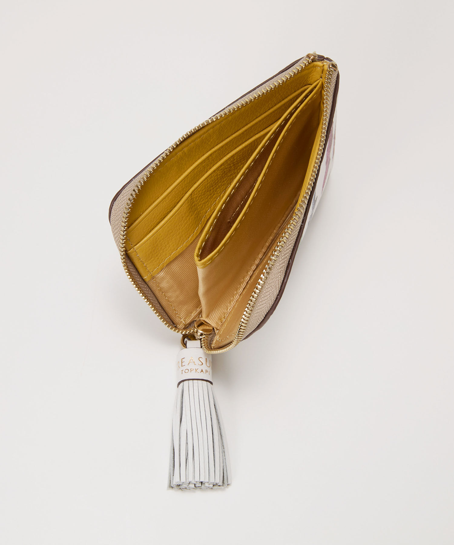 TOPKAPI TREASURE「【TREASURE TOPKAPI】シュリンクレザー タッセル プリント ラウンド 二つ折り財布」|財布|