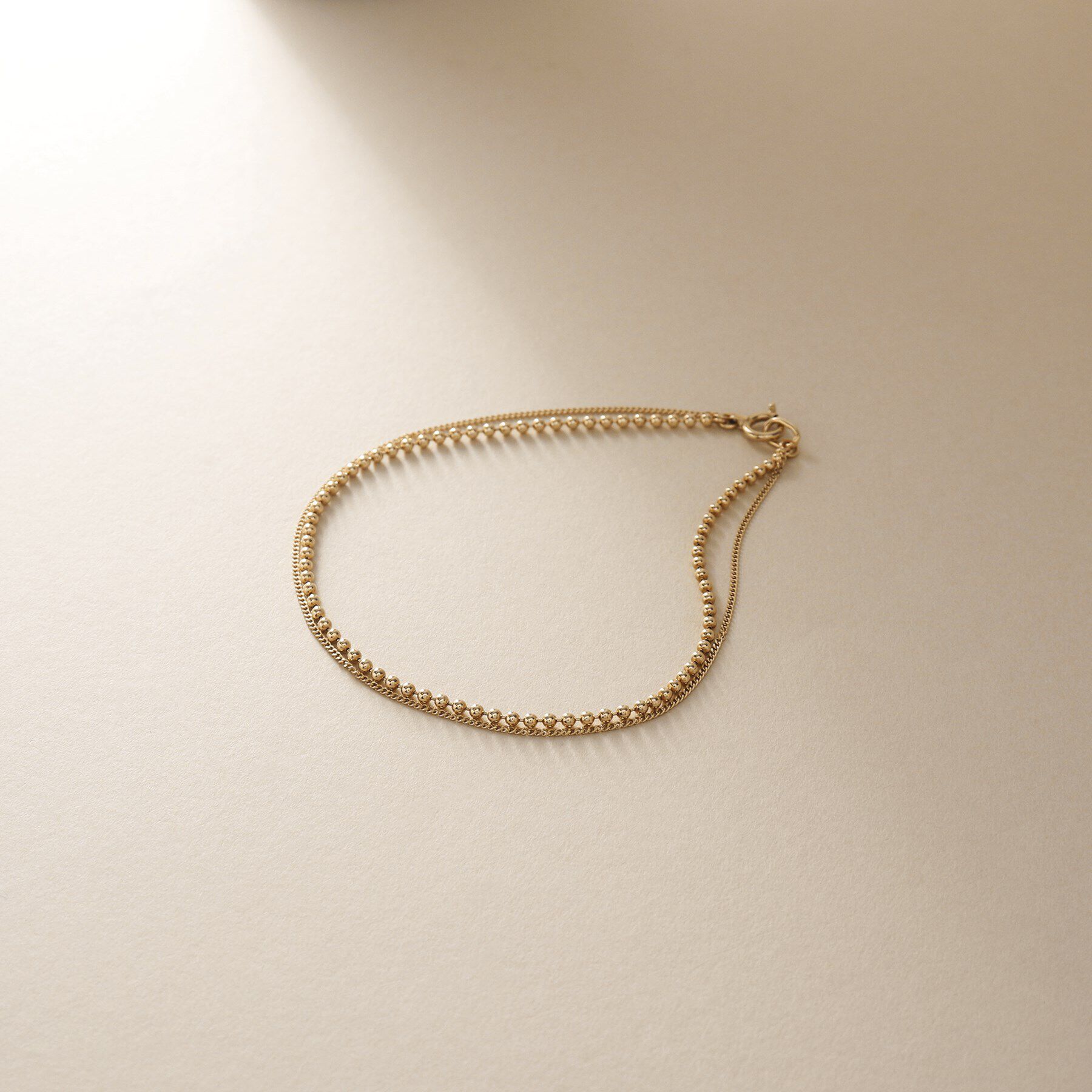 COCOSHNIK「K10ボール&times;キヘイレイヤード ブレスレット」|ブレスレット・バングル|