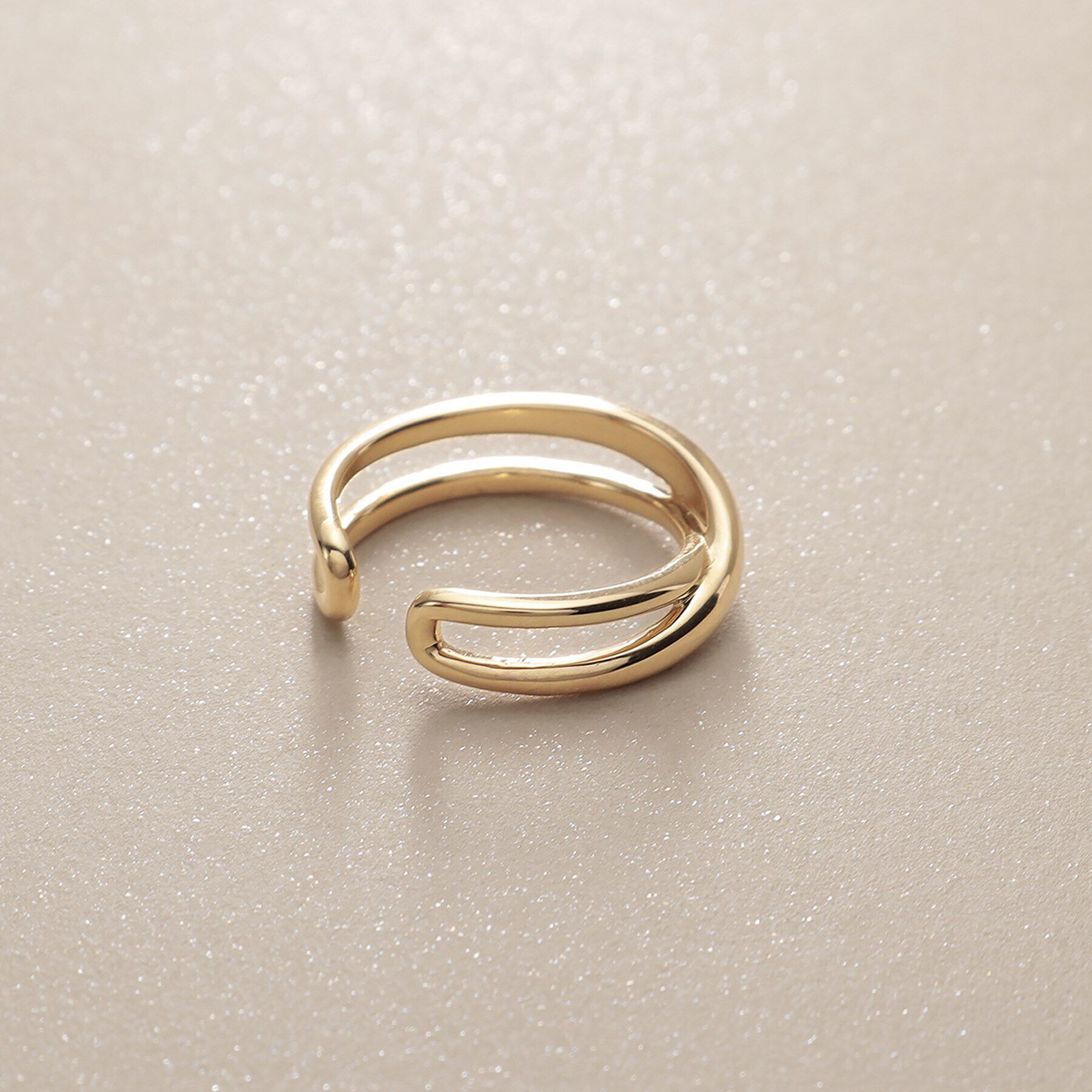 COCOSHNIK「K10月甲クロス イヤーカフ」|イヤリング|