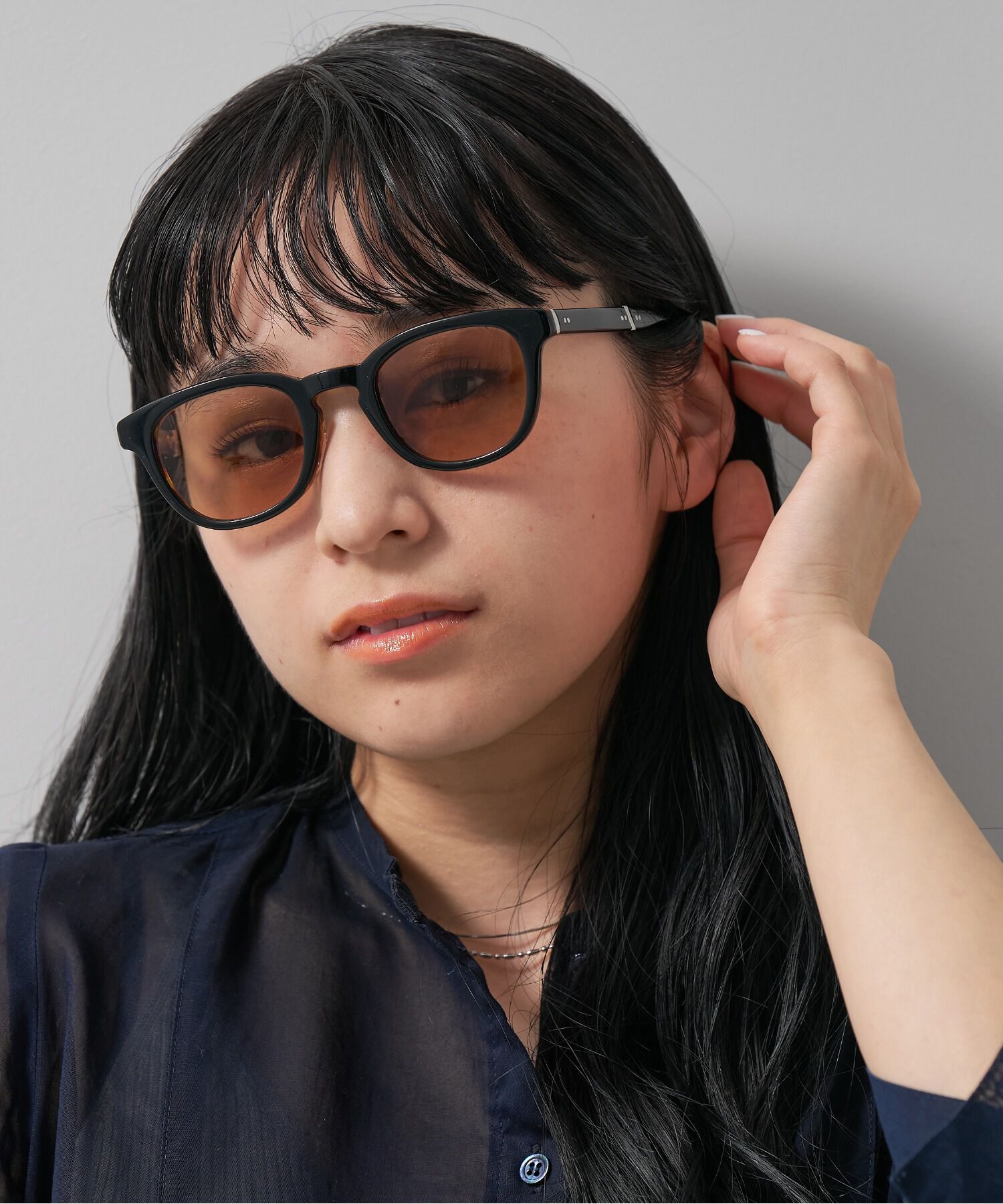  「ウェリントン型 調光サングラス 折りたたみ式｜レンズの色が変わるサングラス UNITED ARROWS Wellness」|サングラス|ブラック系その他