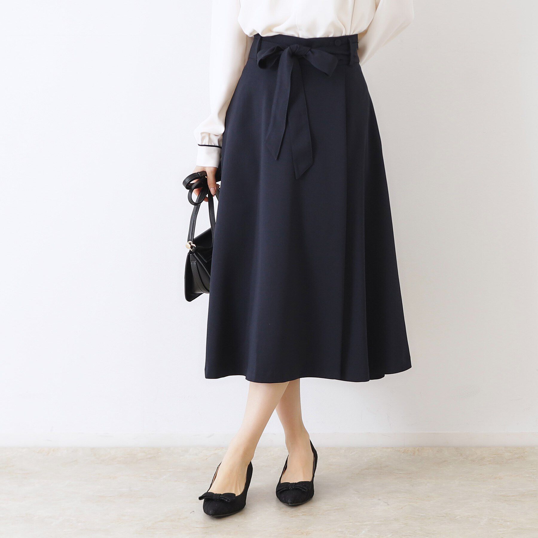 Couture broach「【きれいめ・美脚効果・通勤】ネオシャンブルラップ風スカート」|スカート|ネイビー(094)
