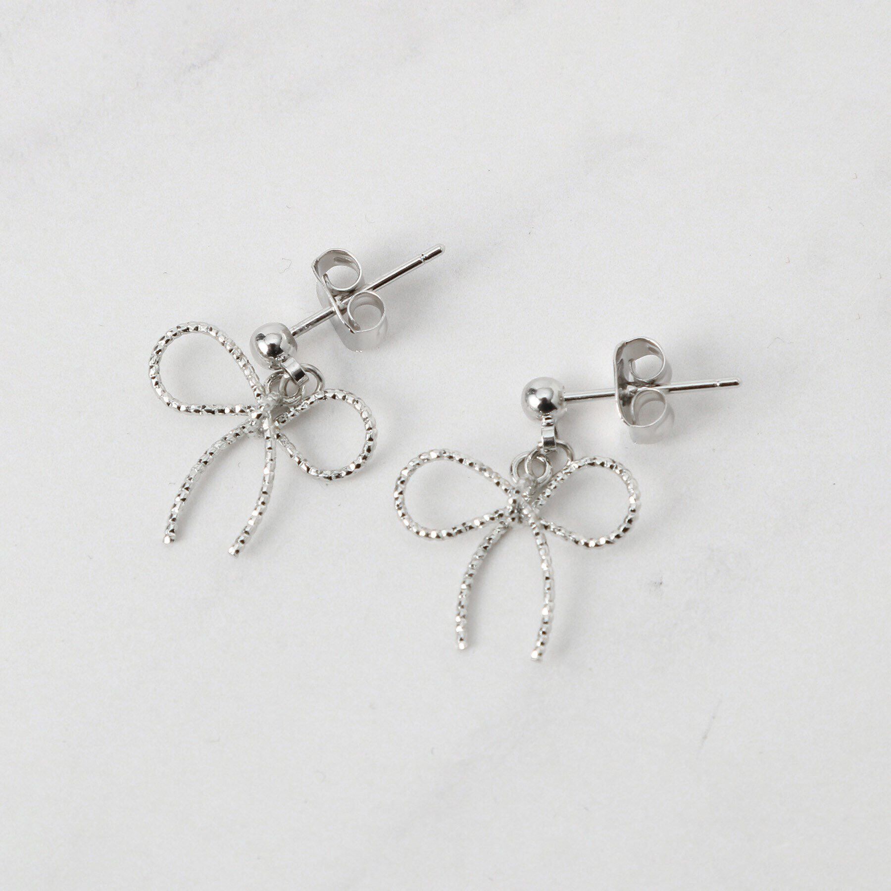 Couture broach「リボンモチーフピアス」|ピアス|