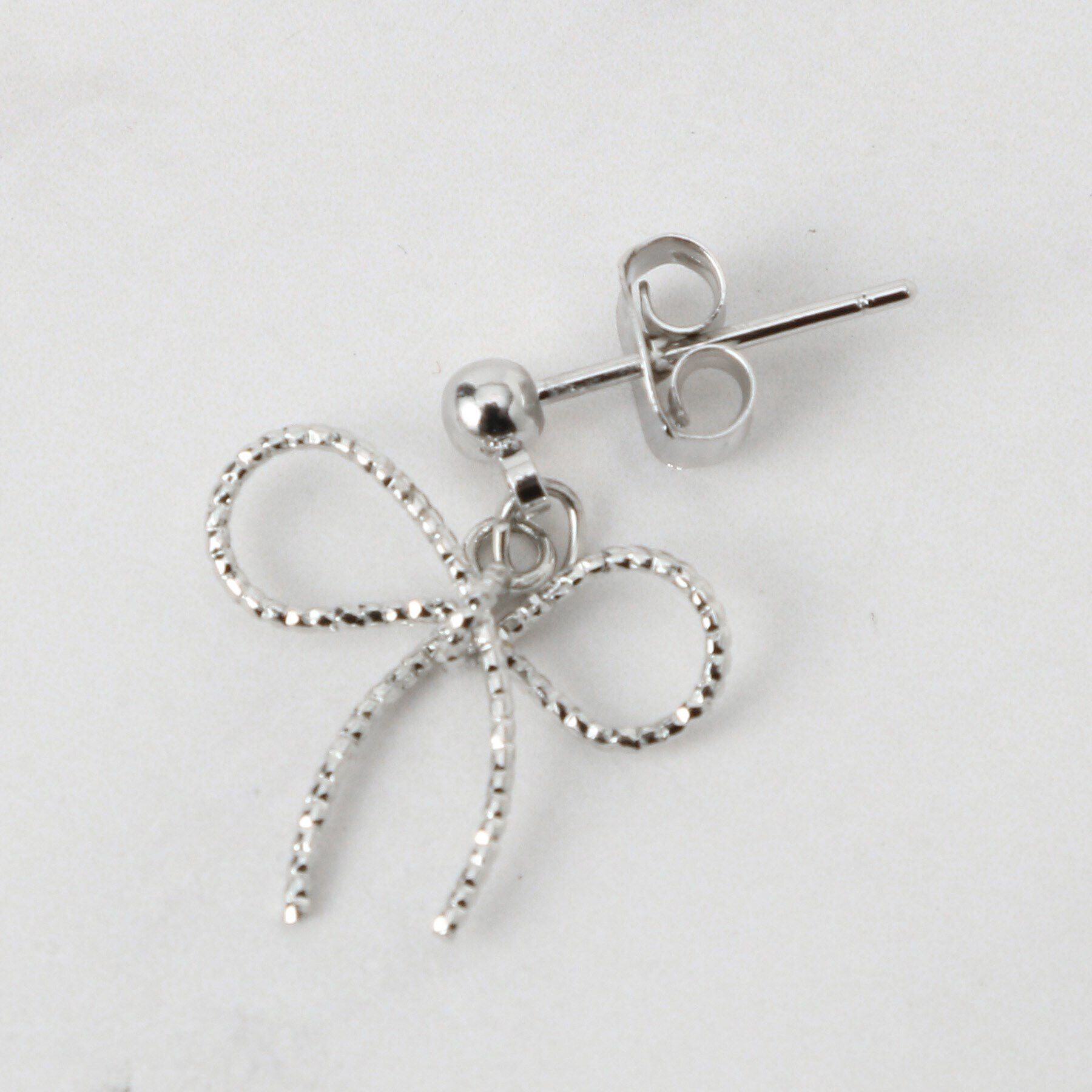 Couture broach「リボンモチーフピアス」|ピアス|