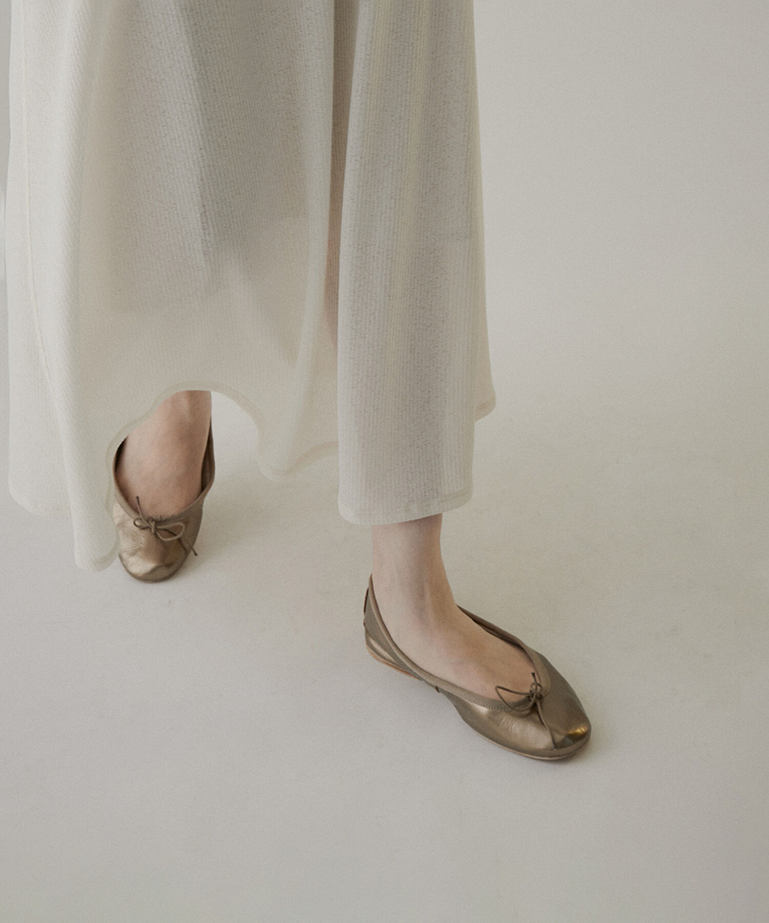 SALON adam et rope'「KINANシアーリブロングスカート」|スカート|