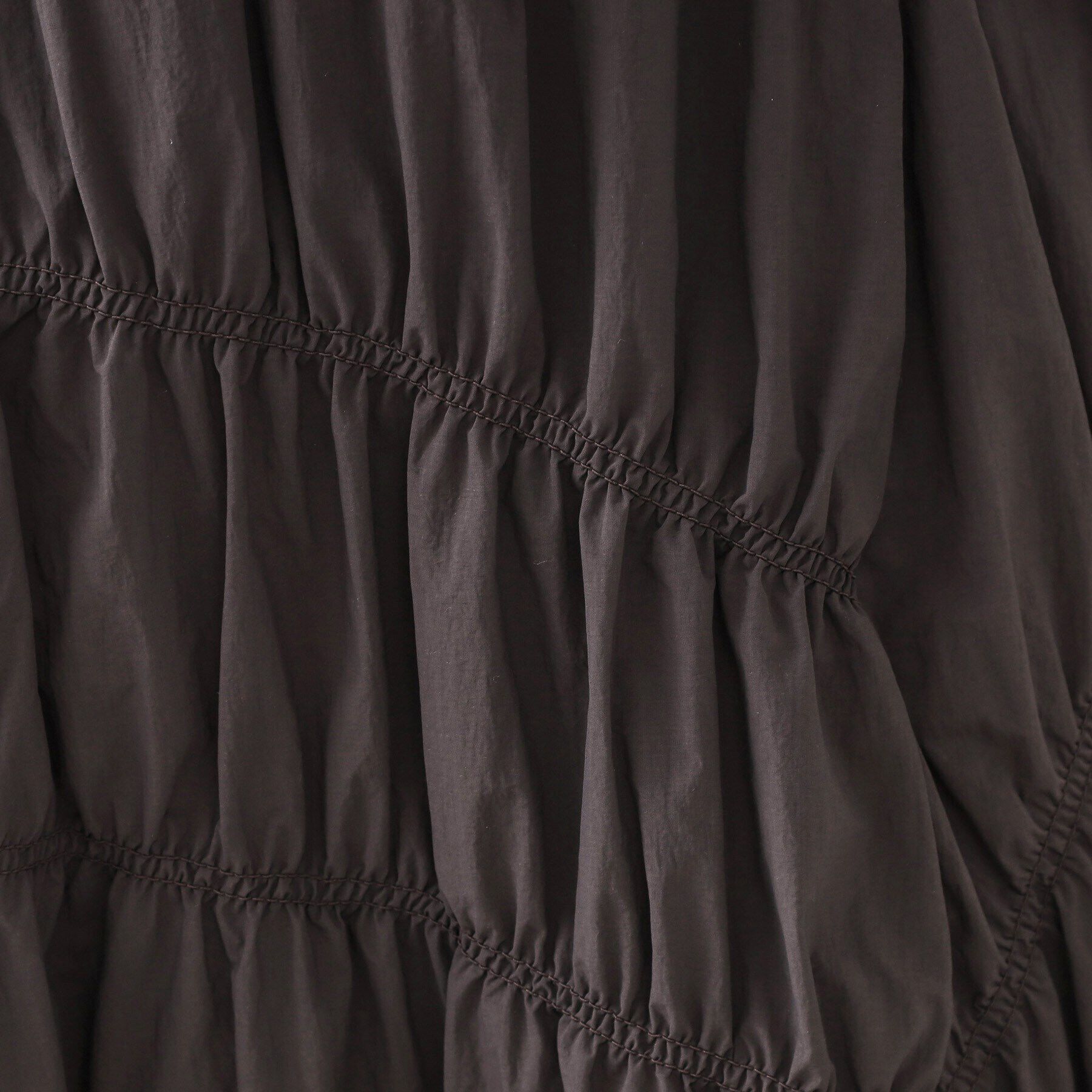 OPAQUE.CLIP「シャーリングアシメフレアスカート【洗濯機洗い可】」|スカート|