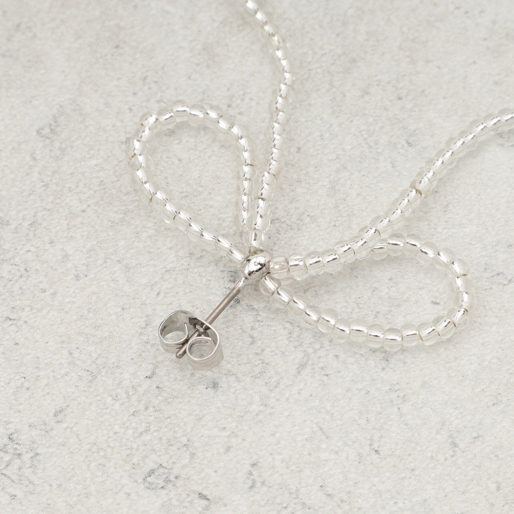 OPAQUE.CLIP「ビーズリボンピアス」|ピアス|