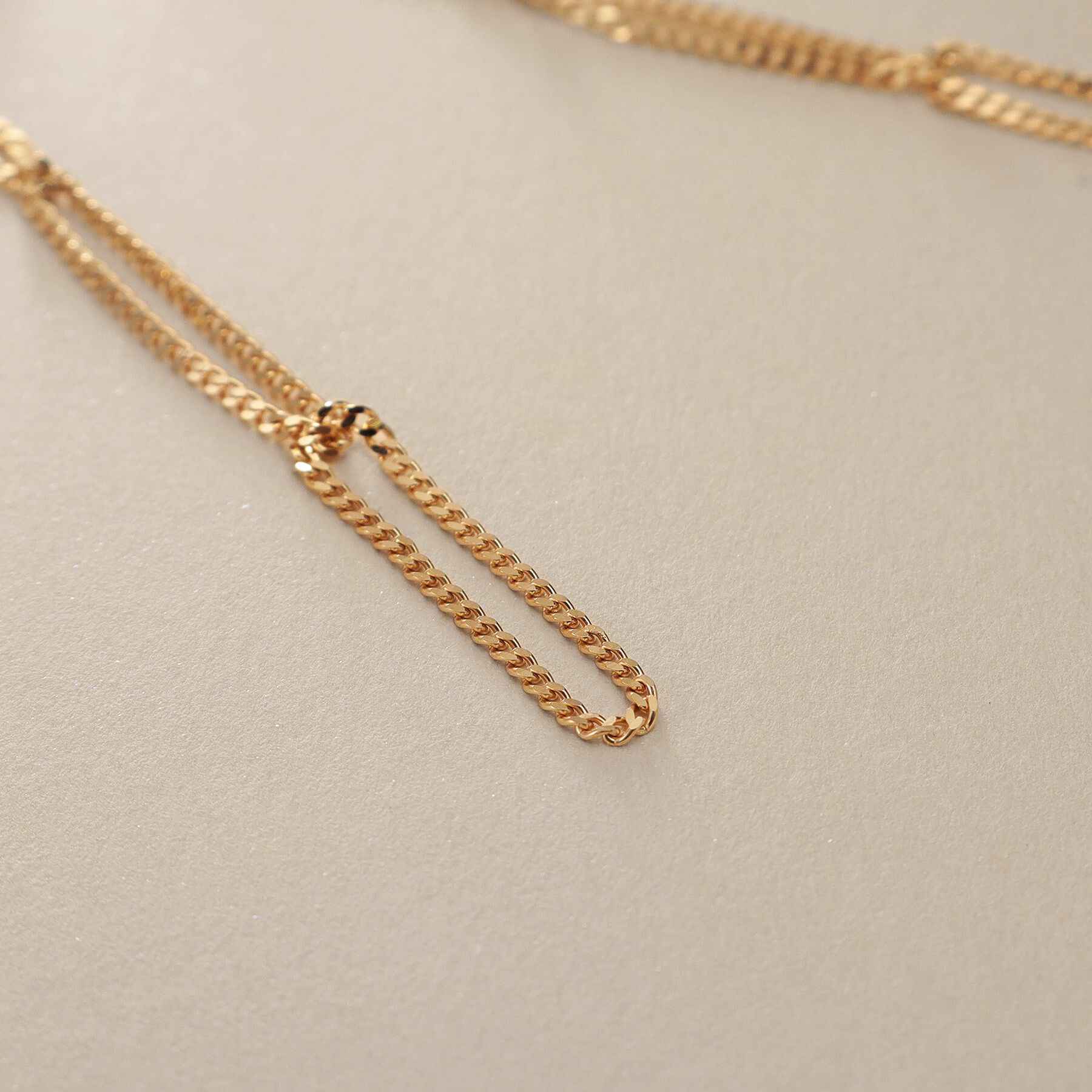 COCOSHNIK「K10キヘイループ スタッドピアス」|ピアス|