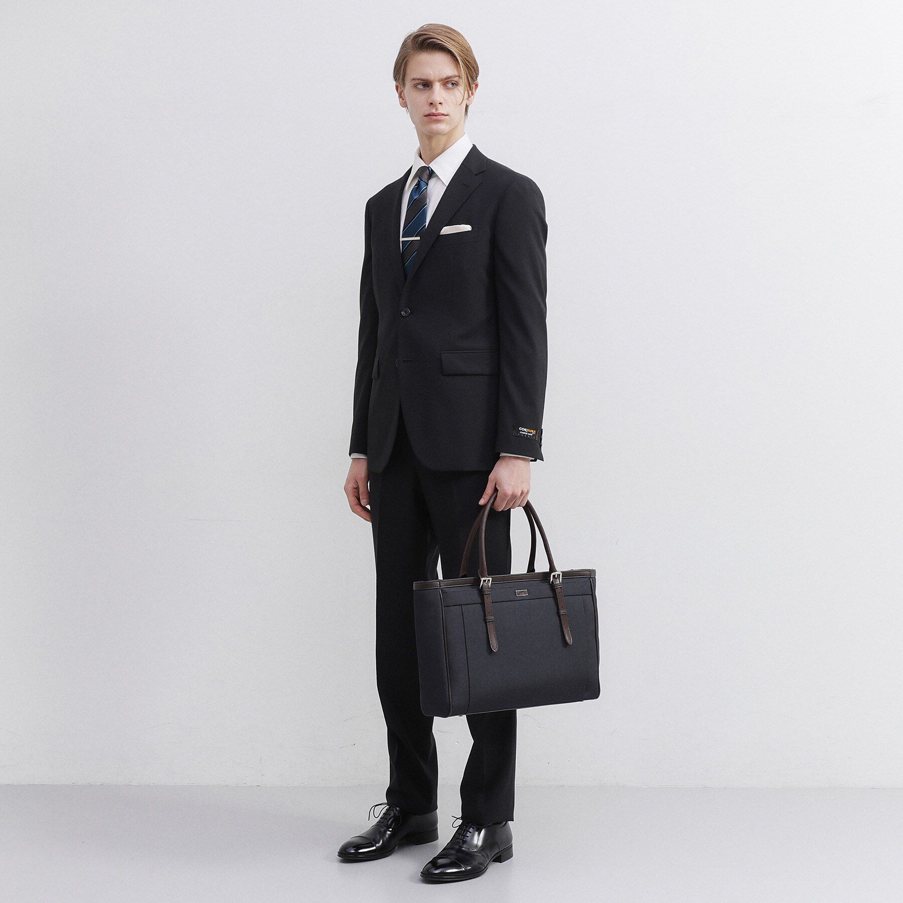 TAKEO KIKUCHI「メランジピンヘッド ブリーフトート」|ビジネスバッグ|