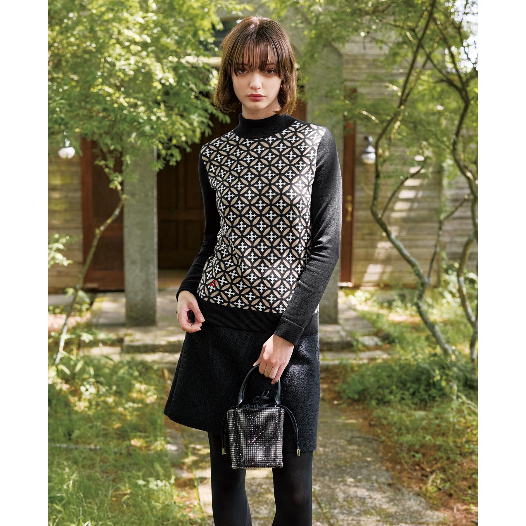 DRESSTERIOR「オーバーラップサークルタートルネック」|ニット・セーター|