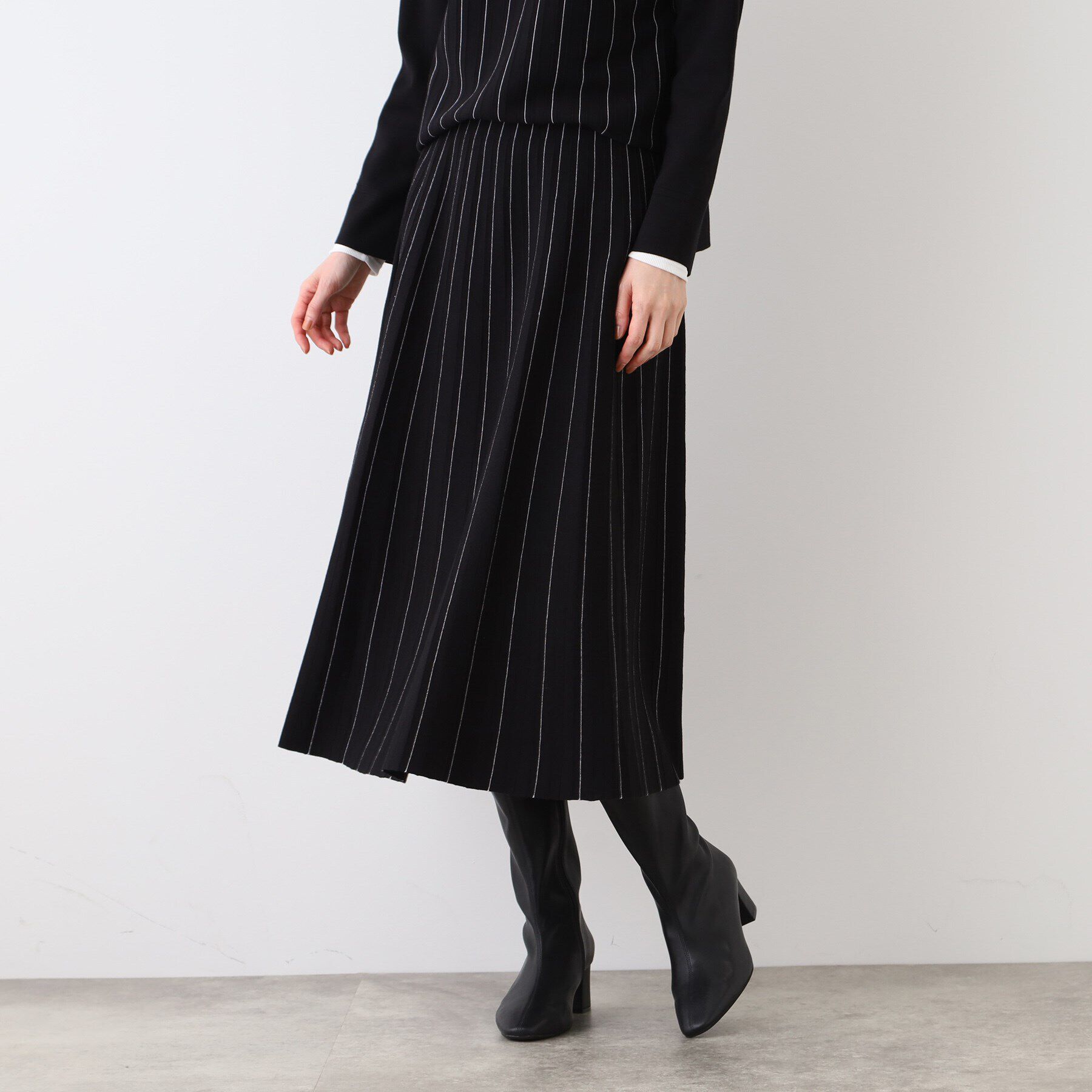 INDIVI「【洗える/SETUP可能】ストライプ柄プリーツニットスカート」|スカート|ブラック(319)