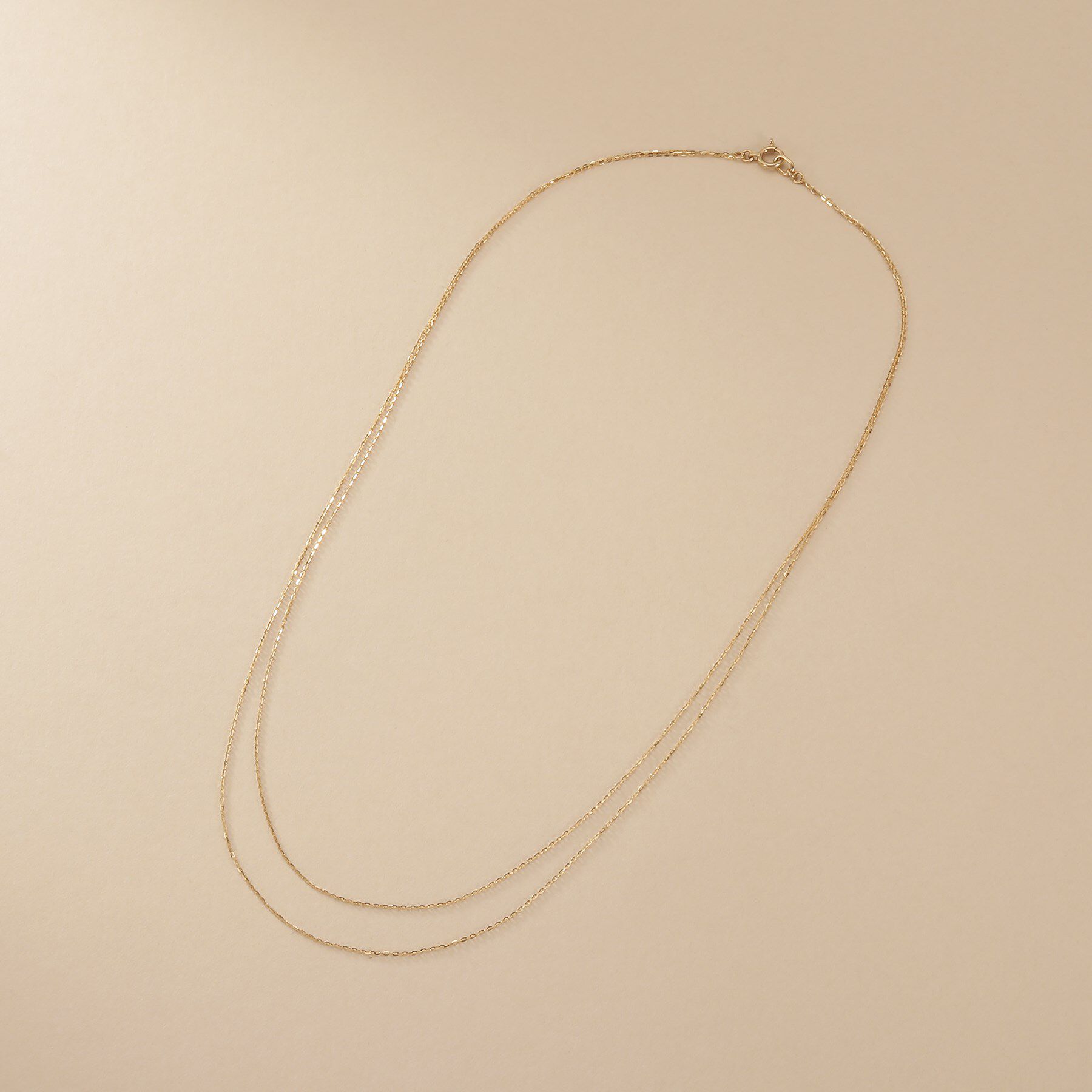 COCOSHNIK ONKITSCH「K10スキニードレープネックレス ミラーカット」|ネックレス|