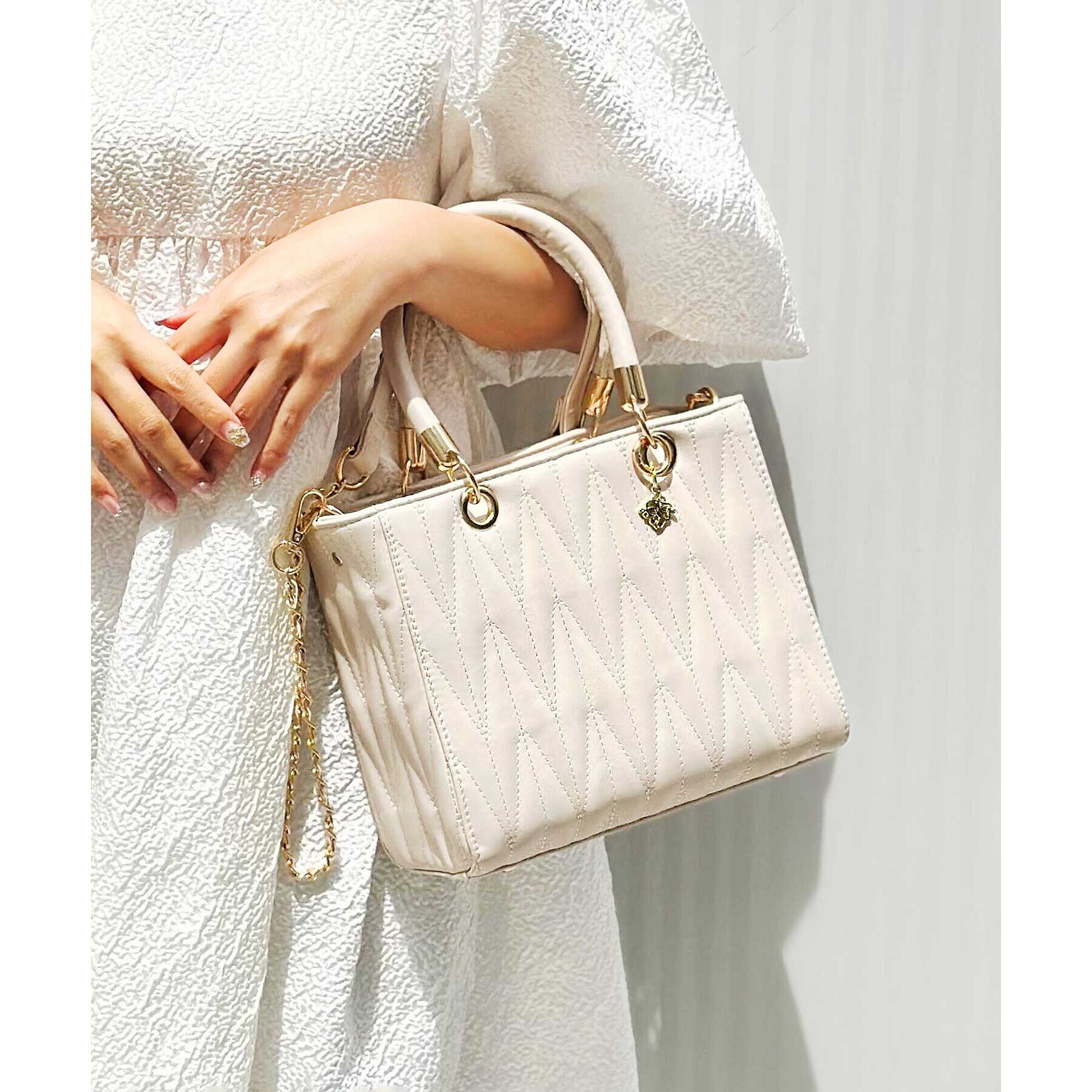 Ober Tashe「チャーム付きキルティング2WAYバッグ」|ハンドバッグ|