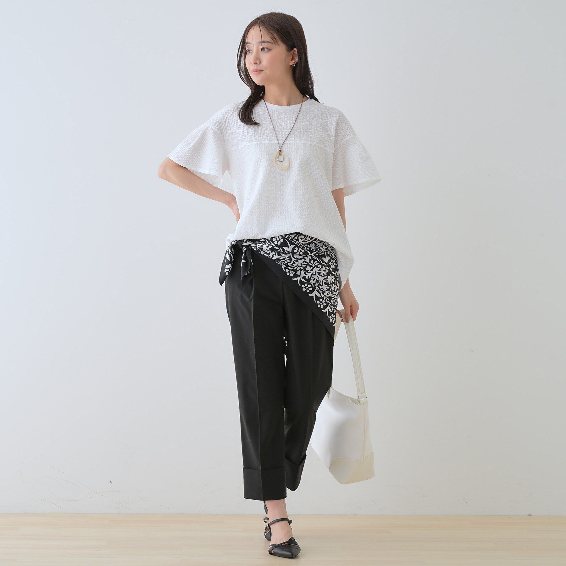 INDIVI「【洗える／体型カバー】凹凸素材フレアデザイントップス」|Tシャツ・カットソー|