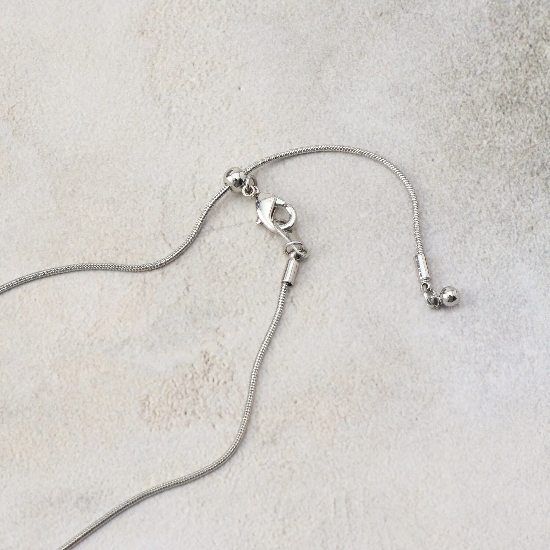 THE SHOP TK「リボンスネークネックレス」|ネックレス|