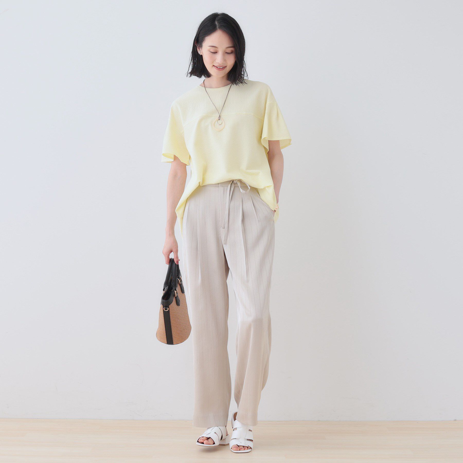 INDIVI「【洗える／体型カバー】凹凸素材フレアデザイントップス」|Tシャツ・カットソー|