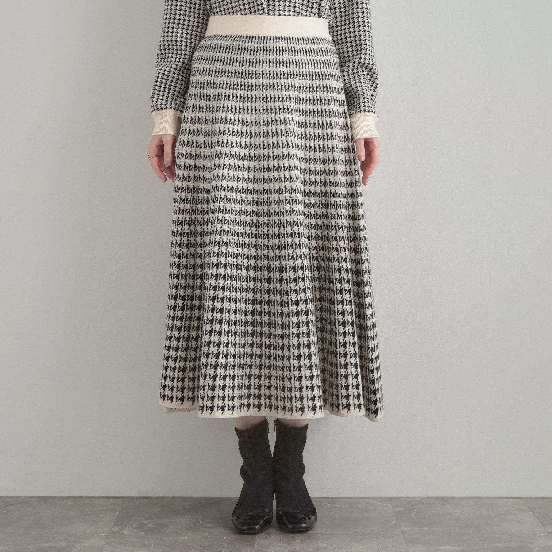 Couture broach「【クラシカル・大人上品】千鳥ジャカードニットプリーツスカート」|スカート|