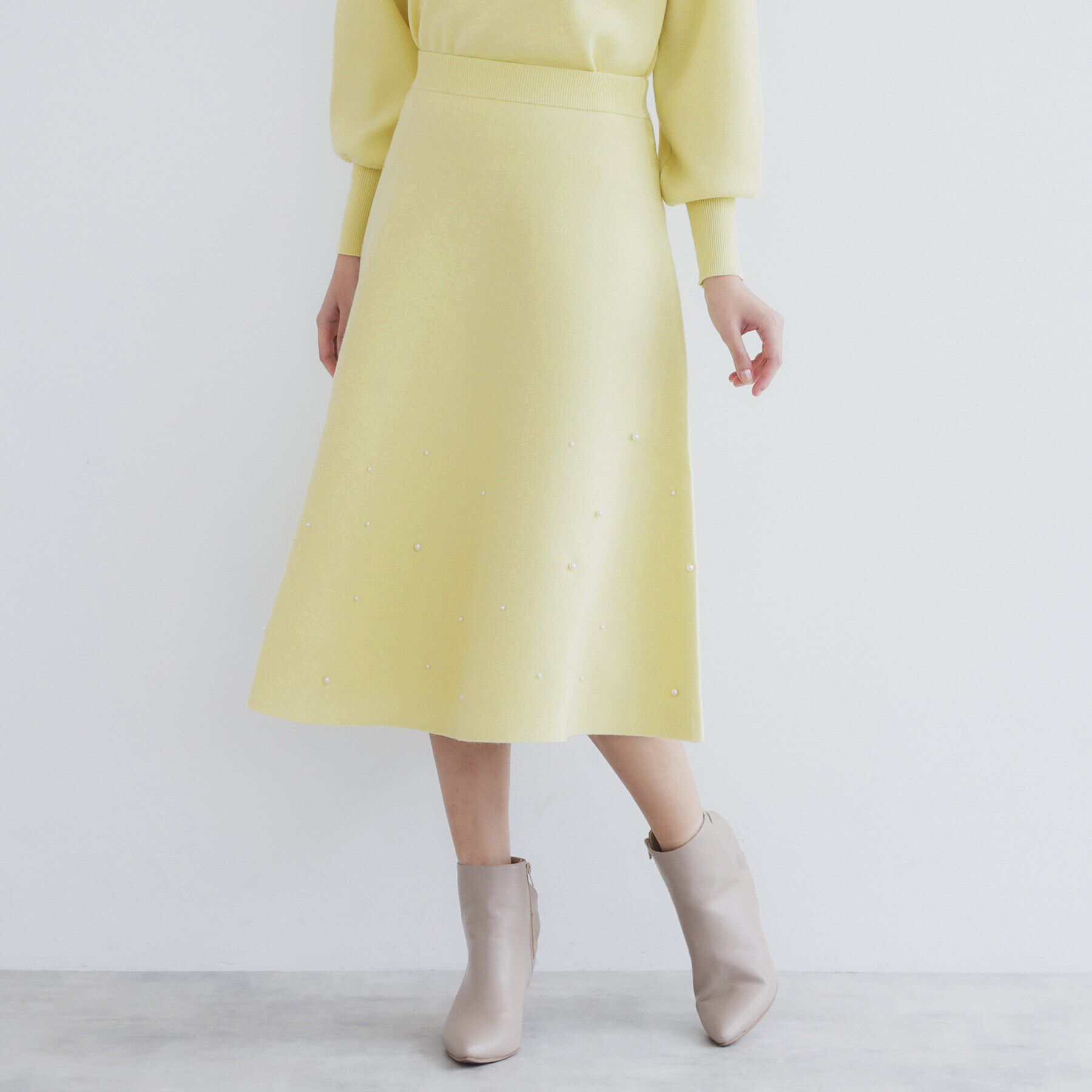 index「《美人百花掲載》パール調フレアニットスカート/セットアップ対応【洗濯機洗い可】」|スカート|