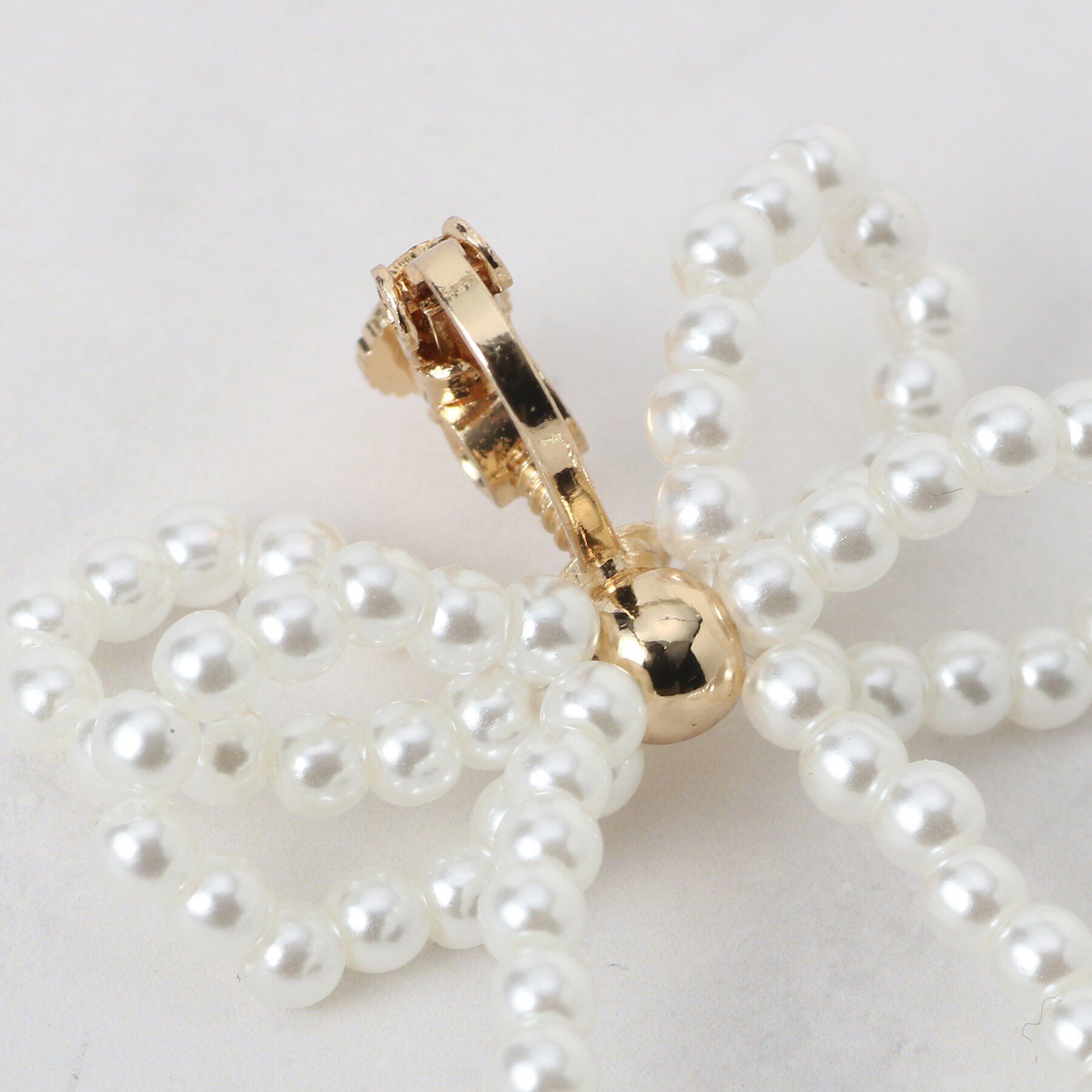 Couture broach「パール調ビーズリボンイヤリング」|イヤリング|