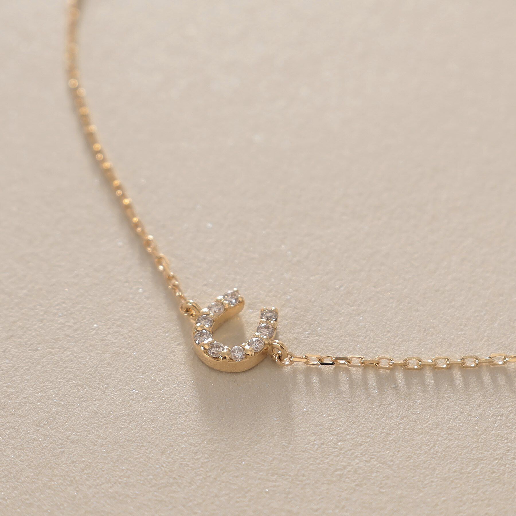 COCOSHNIK「K18ダイヤモンド 馬蹄モチーフ ブレスレット」|ブレスレット・バングル|