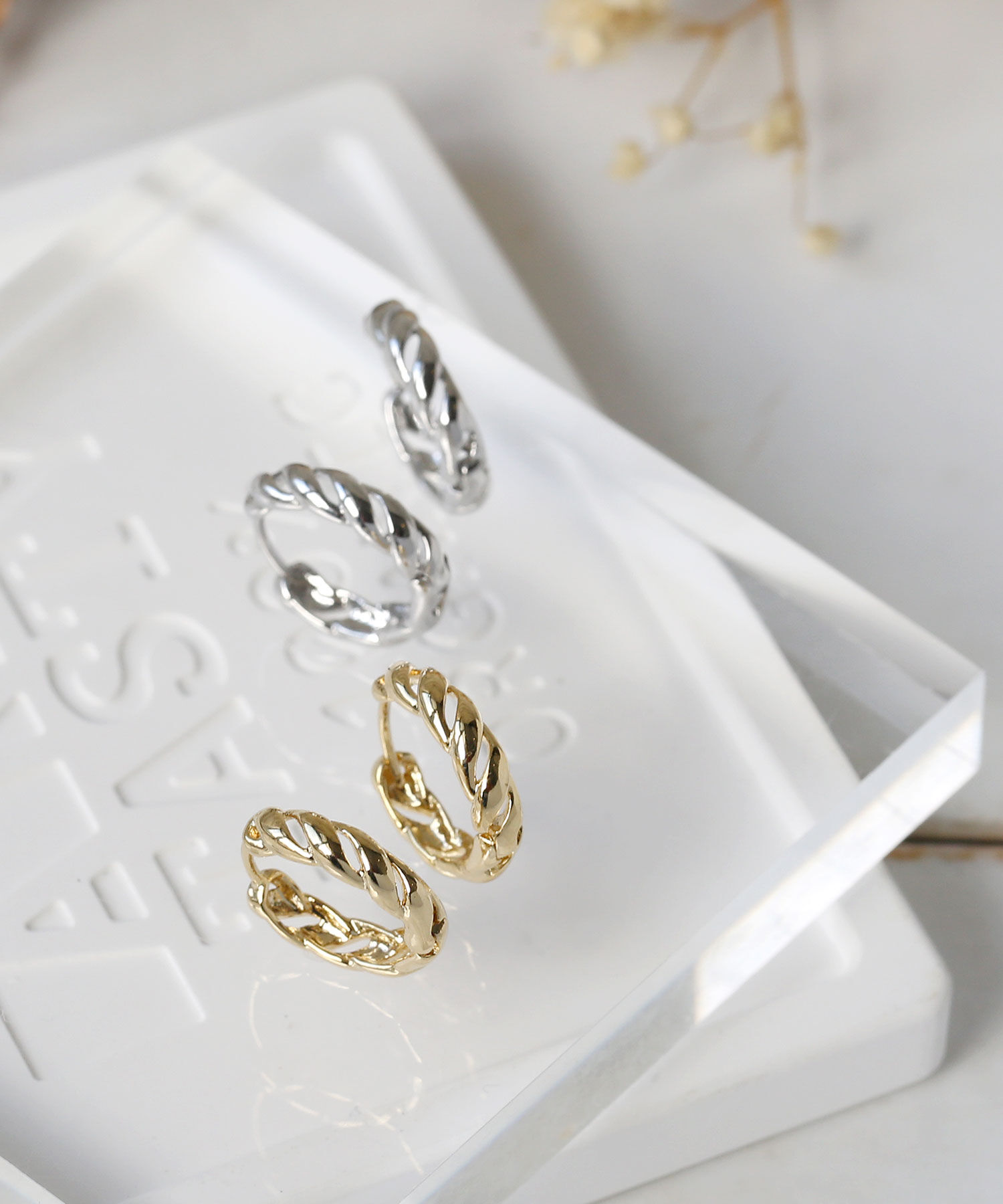 colleca la「透かしツイストフープピアス」|ピアス|