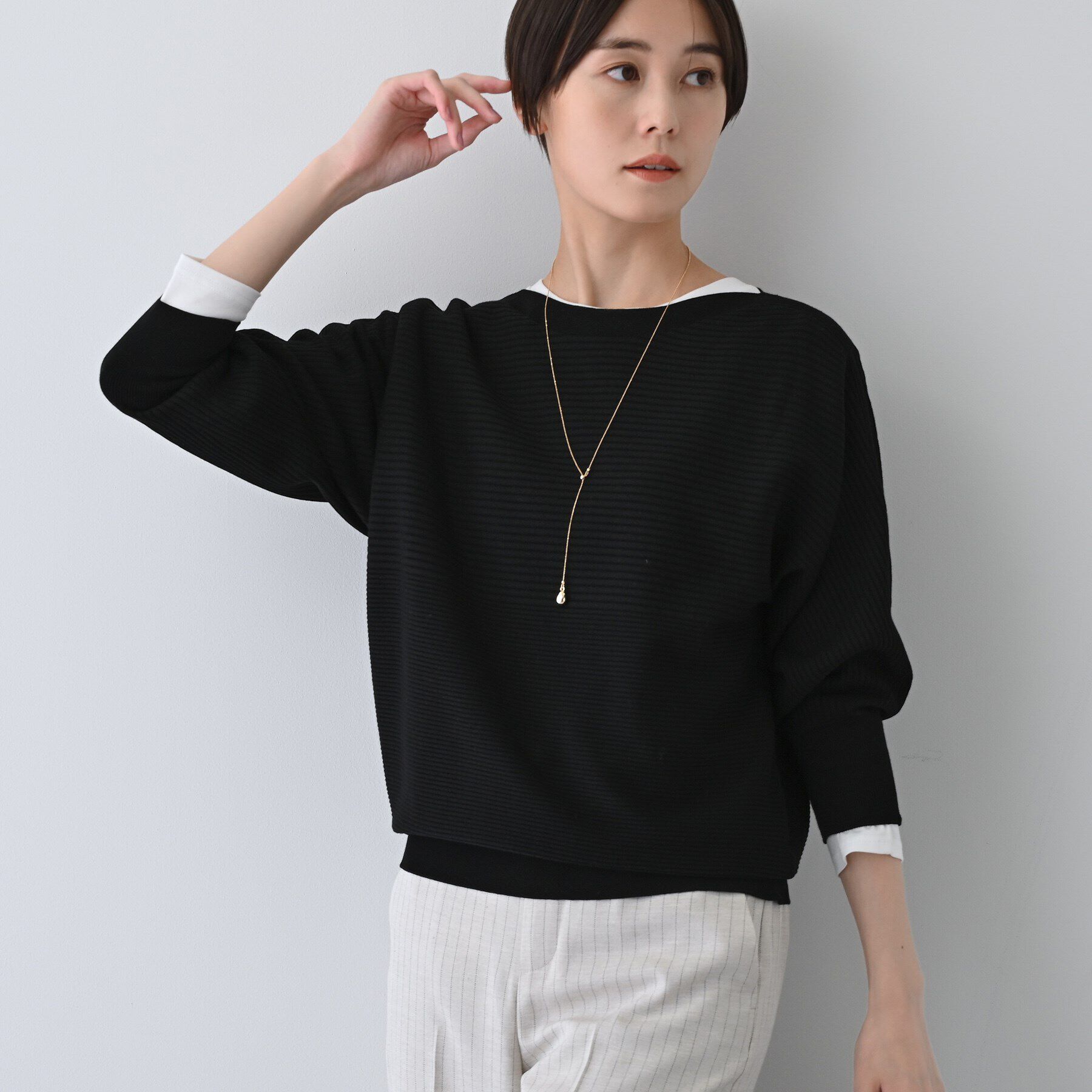 INDIVI「【洗える／無縫製】美シルエット ドルマンスリーブニット」|ニット・セーター|ブラック(019)
