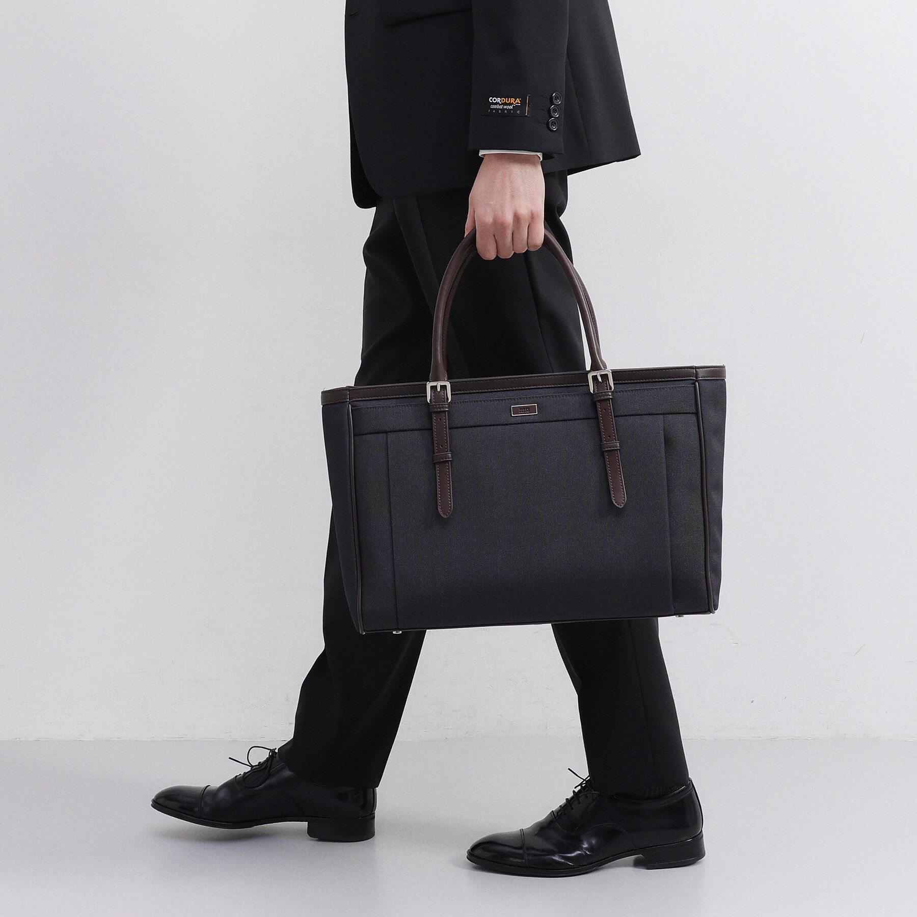 TAKEO KIKUCHI「メランジピンヘッド ブリーフトート」|ビジネスバッグ|