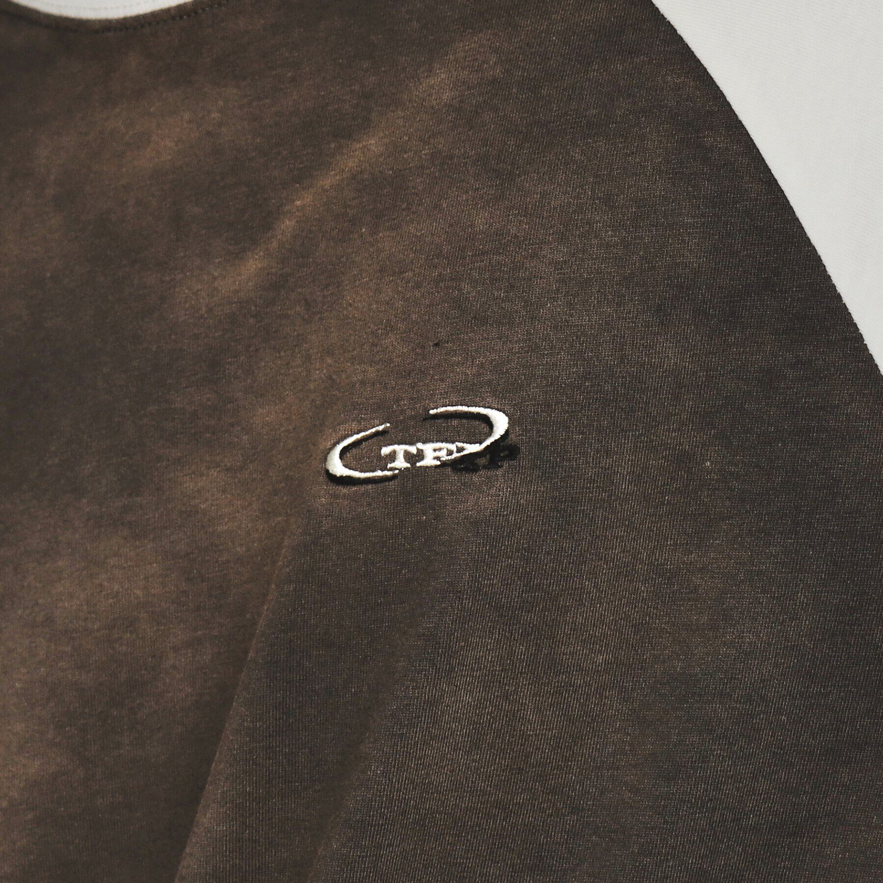 tk.TAKEO KIKUCHI「ブリーチラグランスリーブTシャツ」|Tシャツ・カットソー|