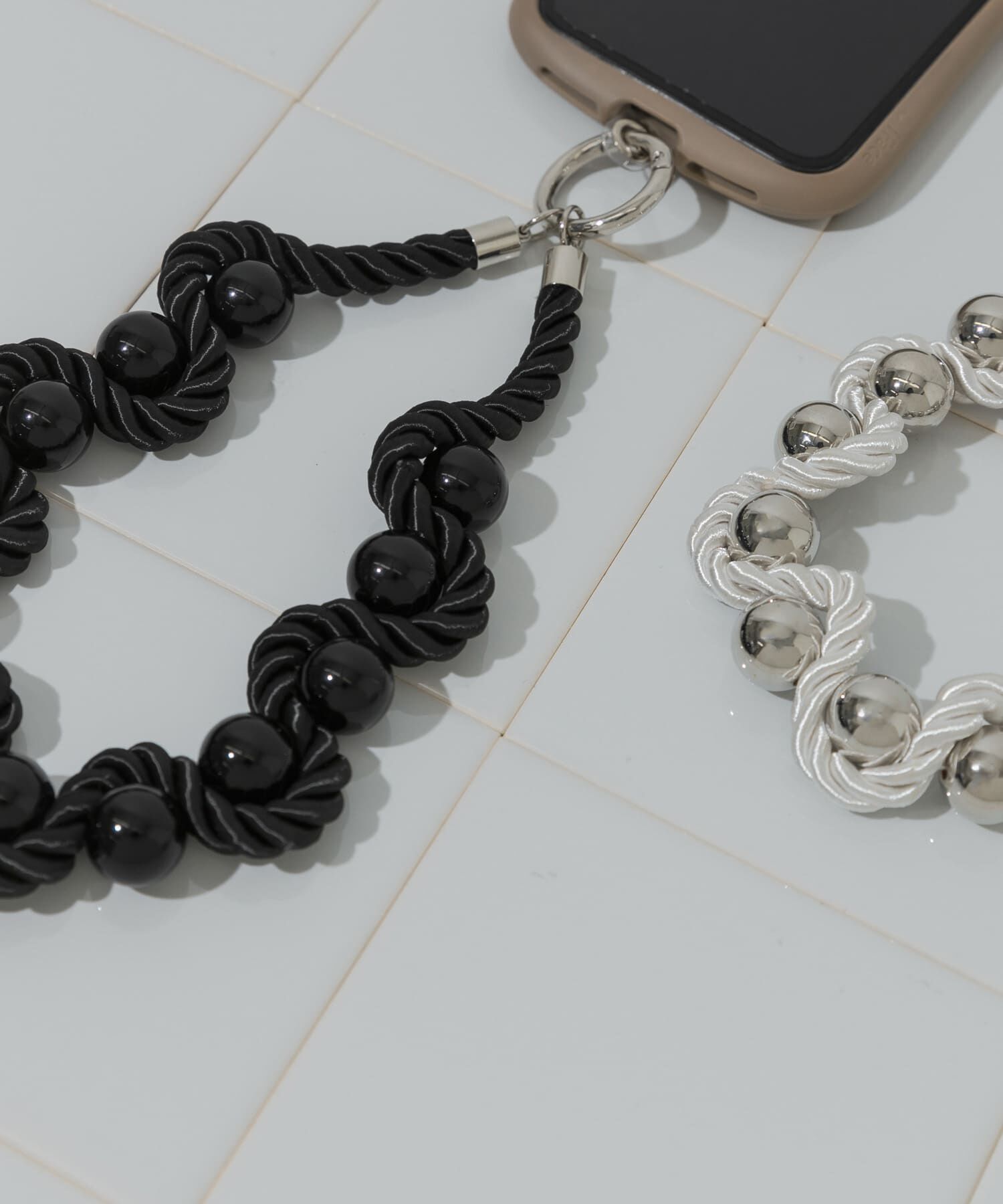 SMELLY「ツイストロープボールハンドストラップ」|モバイルケース|