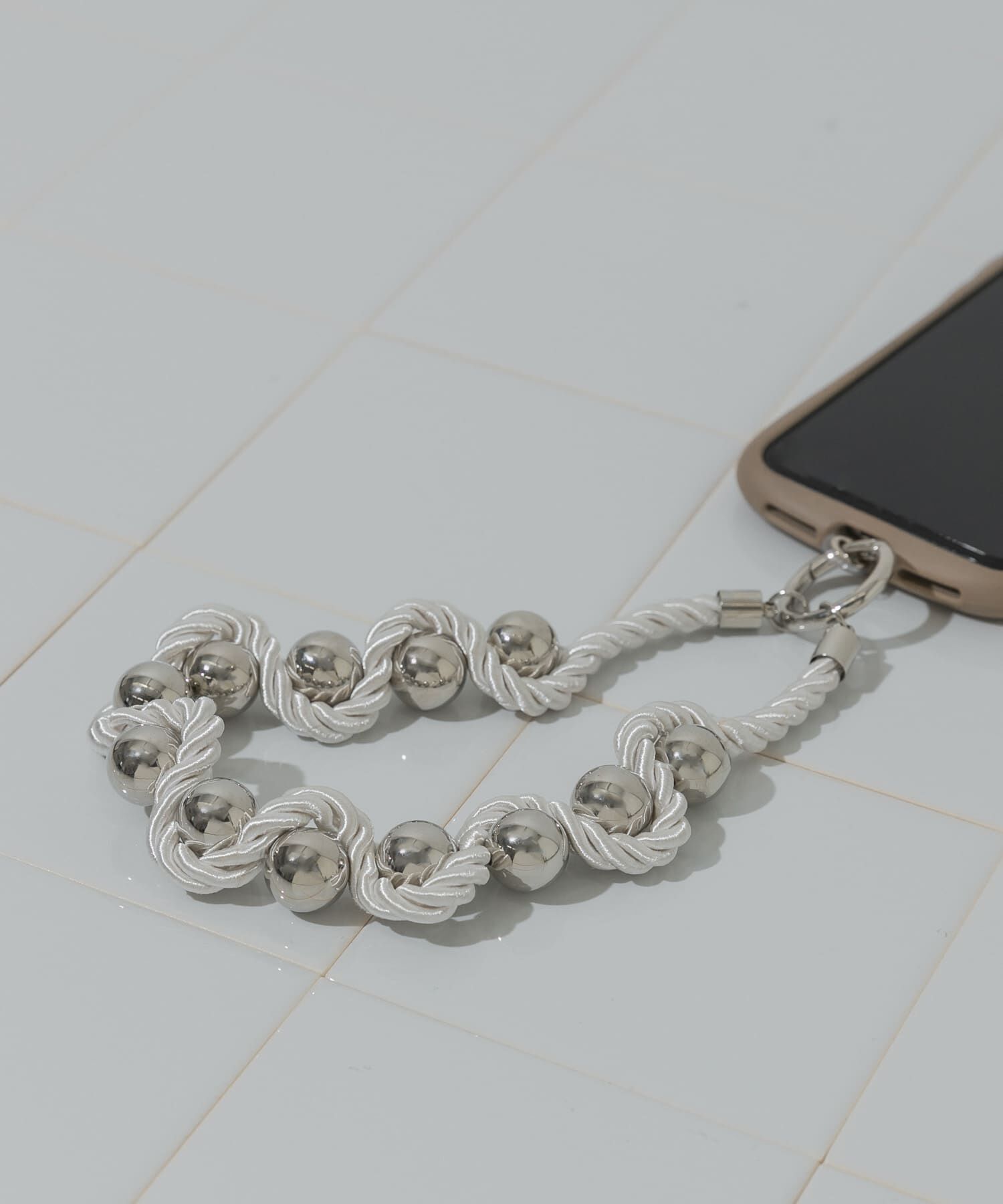 SMELLY「ツイストロープボールハンドストラップ」|モバイルケース|