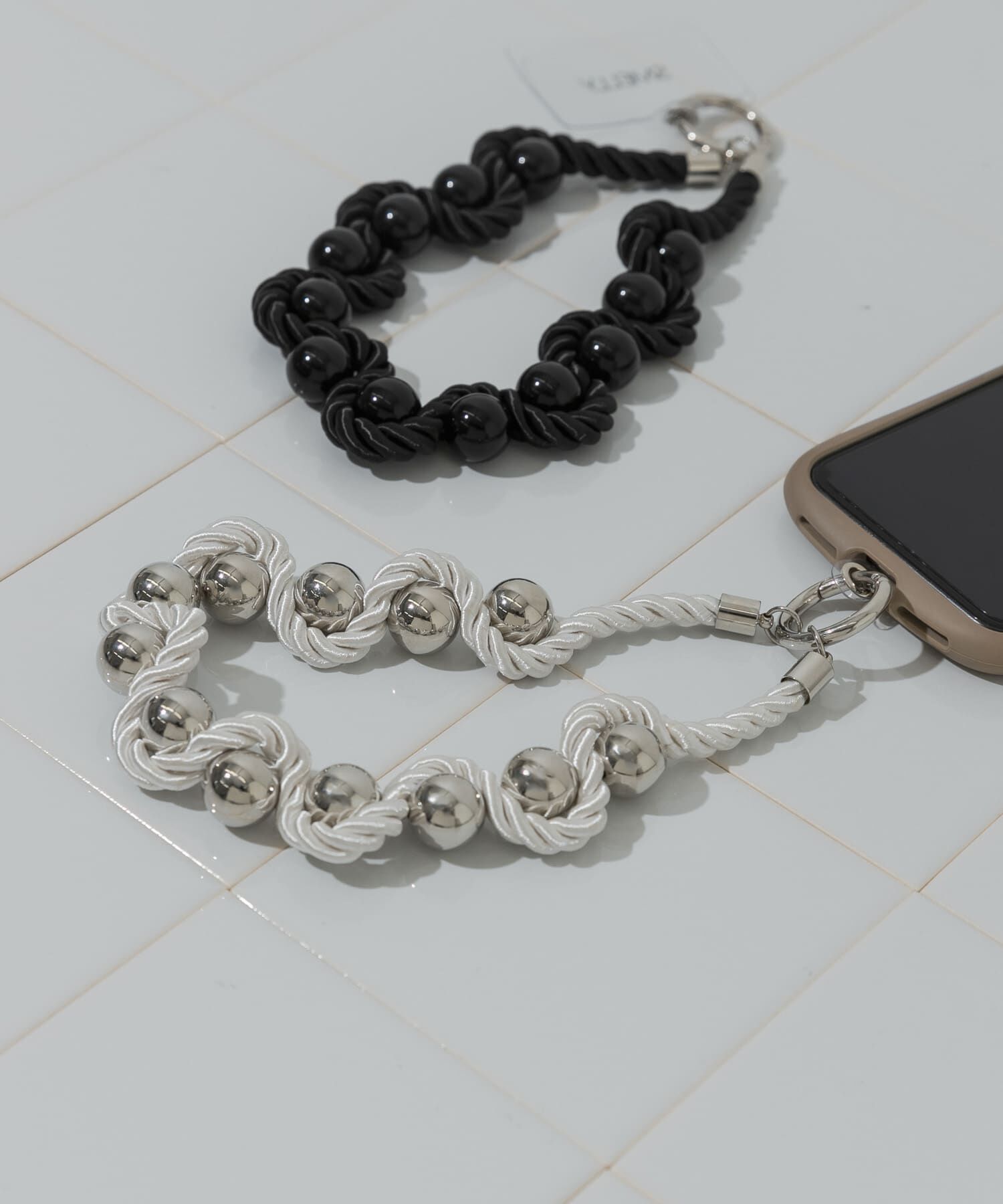 SMELLY「ツイストロープボールハンドストラップ」|モバイルケース|