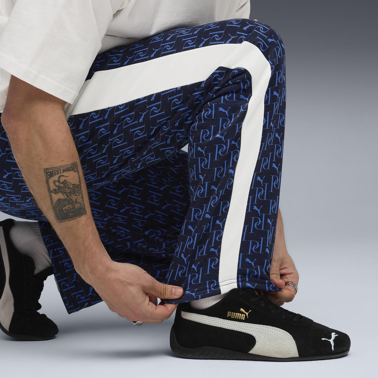 PUMA「【PUMA ｳｪｱ】M T7 AOP RELAXED TRACK PANTS」|チノ|