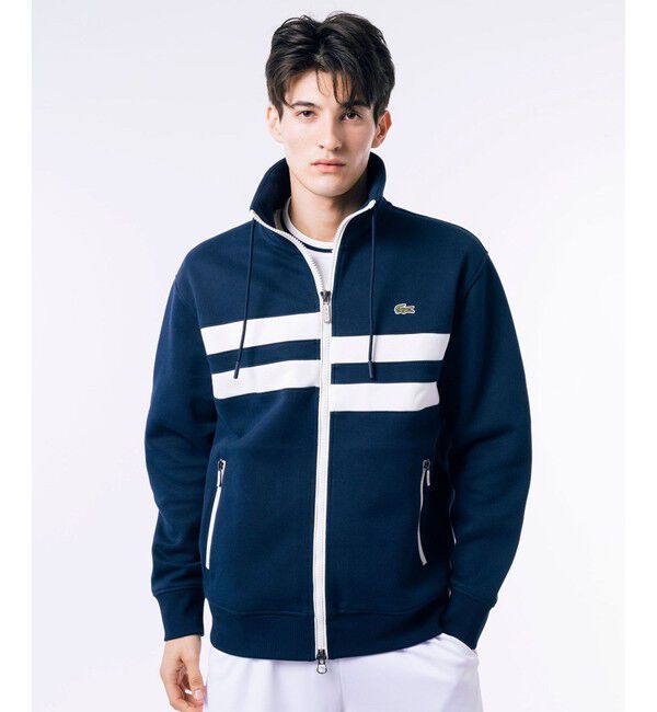 LACOSTE「アシンメトリーボーダーハイネック ドローストリング 鹿の子地 トラックジャケット」|スウェット・ジャージ|ネイビー