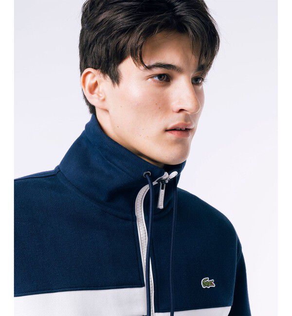 LACOSTE「アシンメトリーボーダーハイネック ドローストリング 鹿の子地 トラックジャケット」|スウェット・ジャージ|
