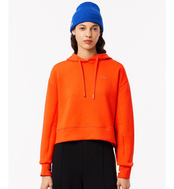 LACOSTE「ワイド＆クロップドフードスウェットパーカー / フーディー」|パーカー|オレンジ系その他