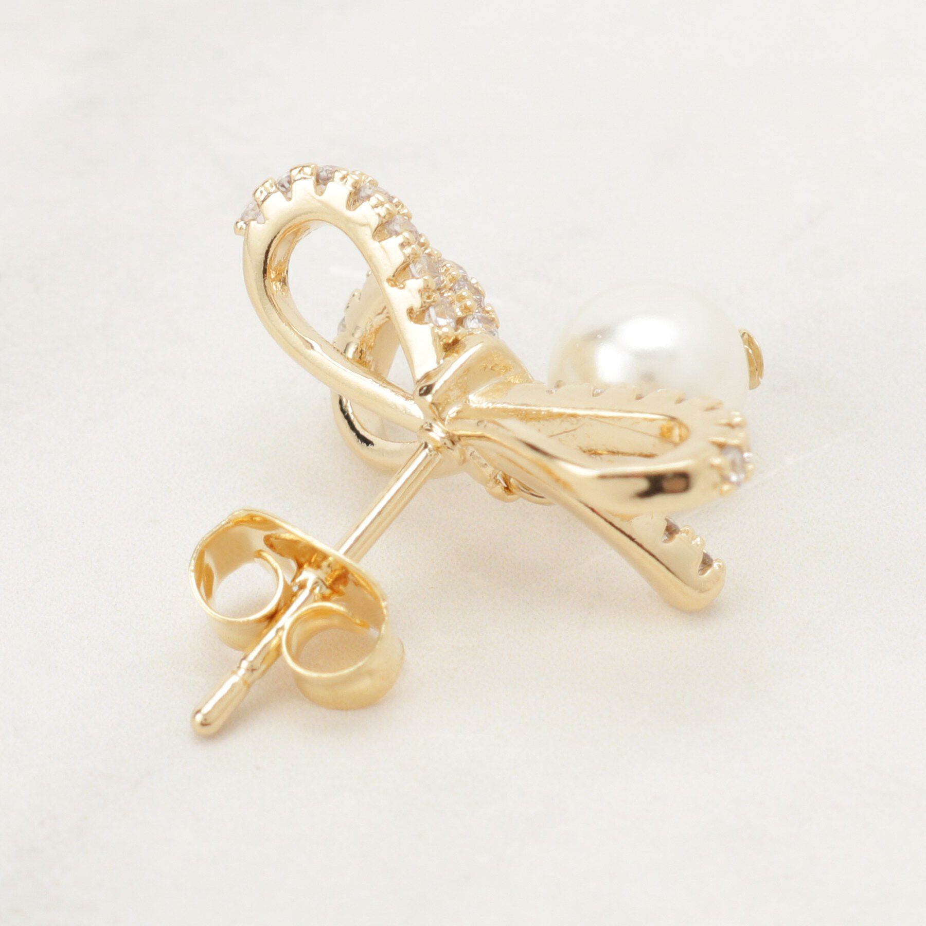 Couture broach「ビジューリボンパール調ピアス」|ピアス|