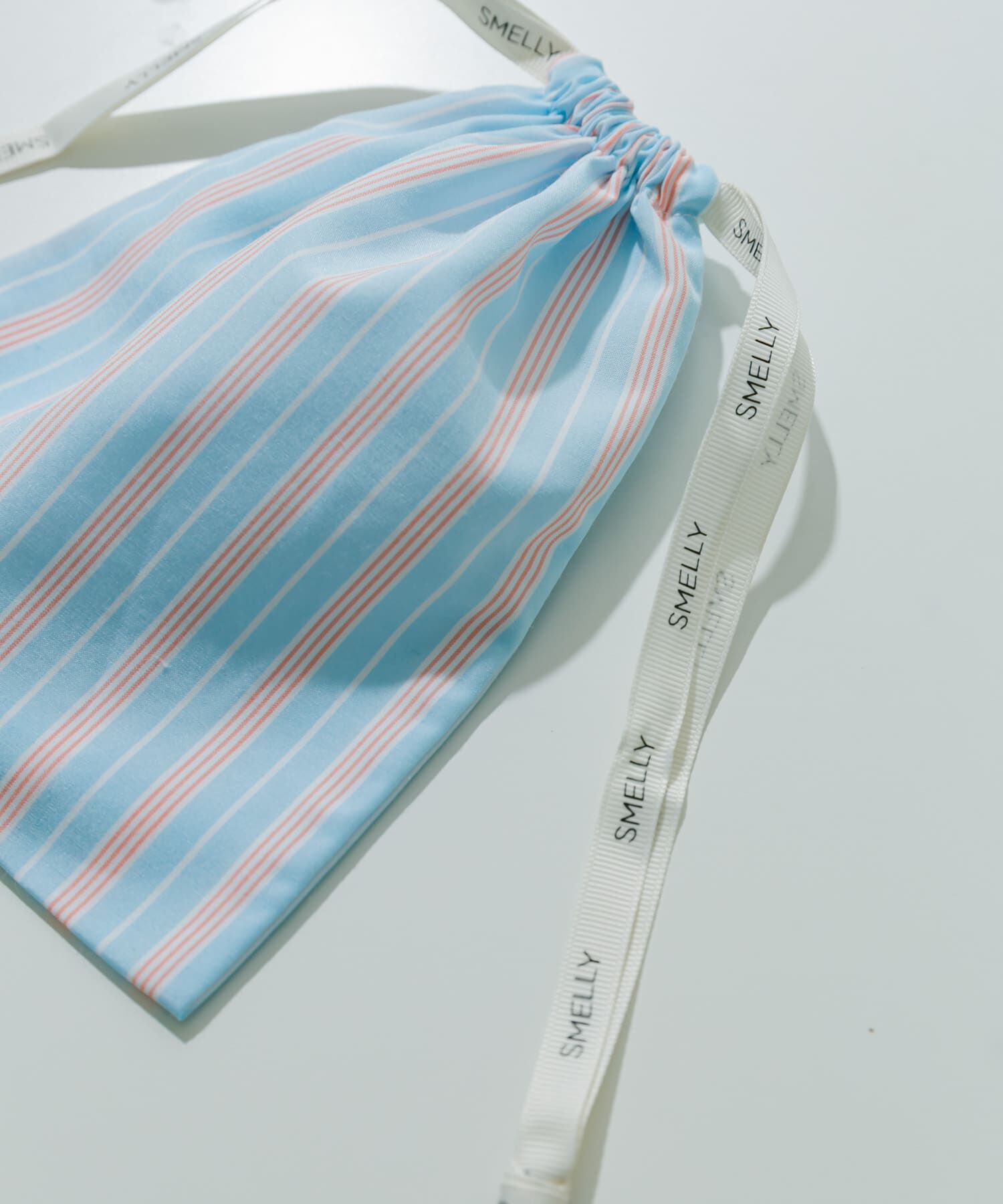 SMELLY「『WEB/一部店舗限定』プリントキンチャクポーチ」|ポーチ|