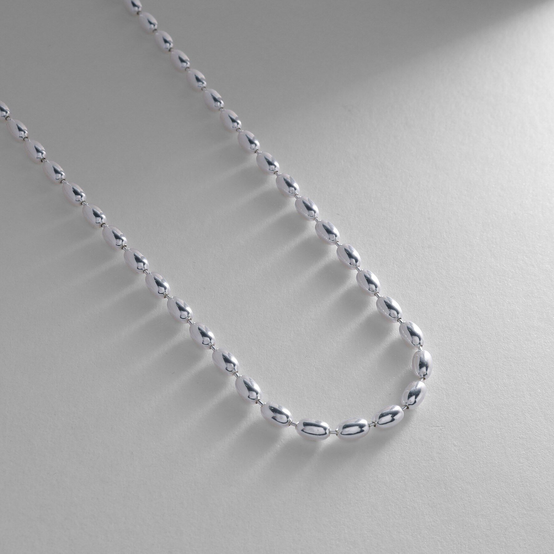 COCOSHNIK ONKITSCH「シルバー デザインチェーン オーバルボールL ネックレス」|ネックレス|