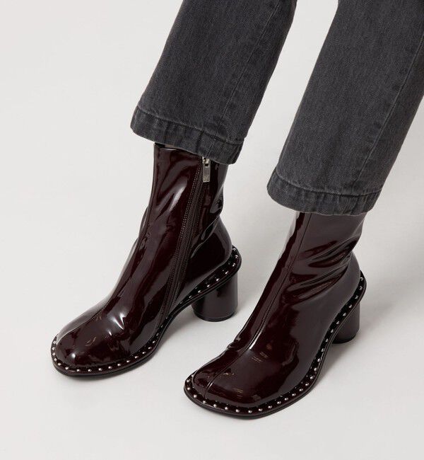 ODETTE E ODILE「＜SY＞ オブリークスタッズピースショートブーツ70&uarr;」|ショートブーツ|