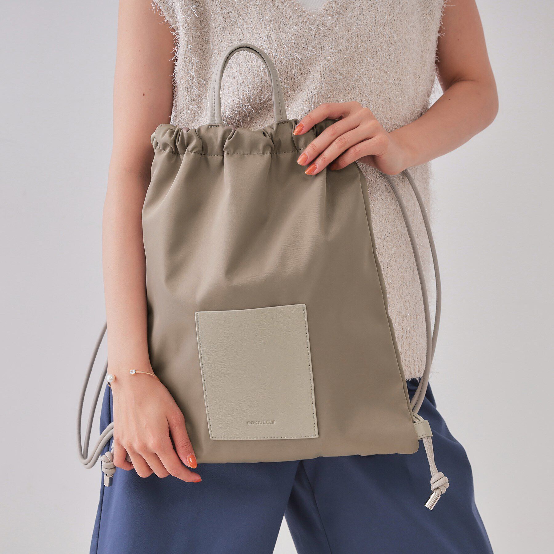 OPAQUE.CLIP「【A4サイズ対応】フロントポケットデザインナップザック」|リュック|グレージュ(050)